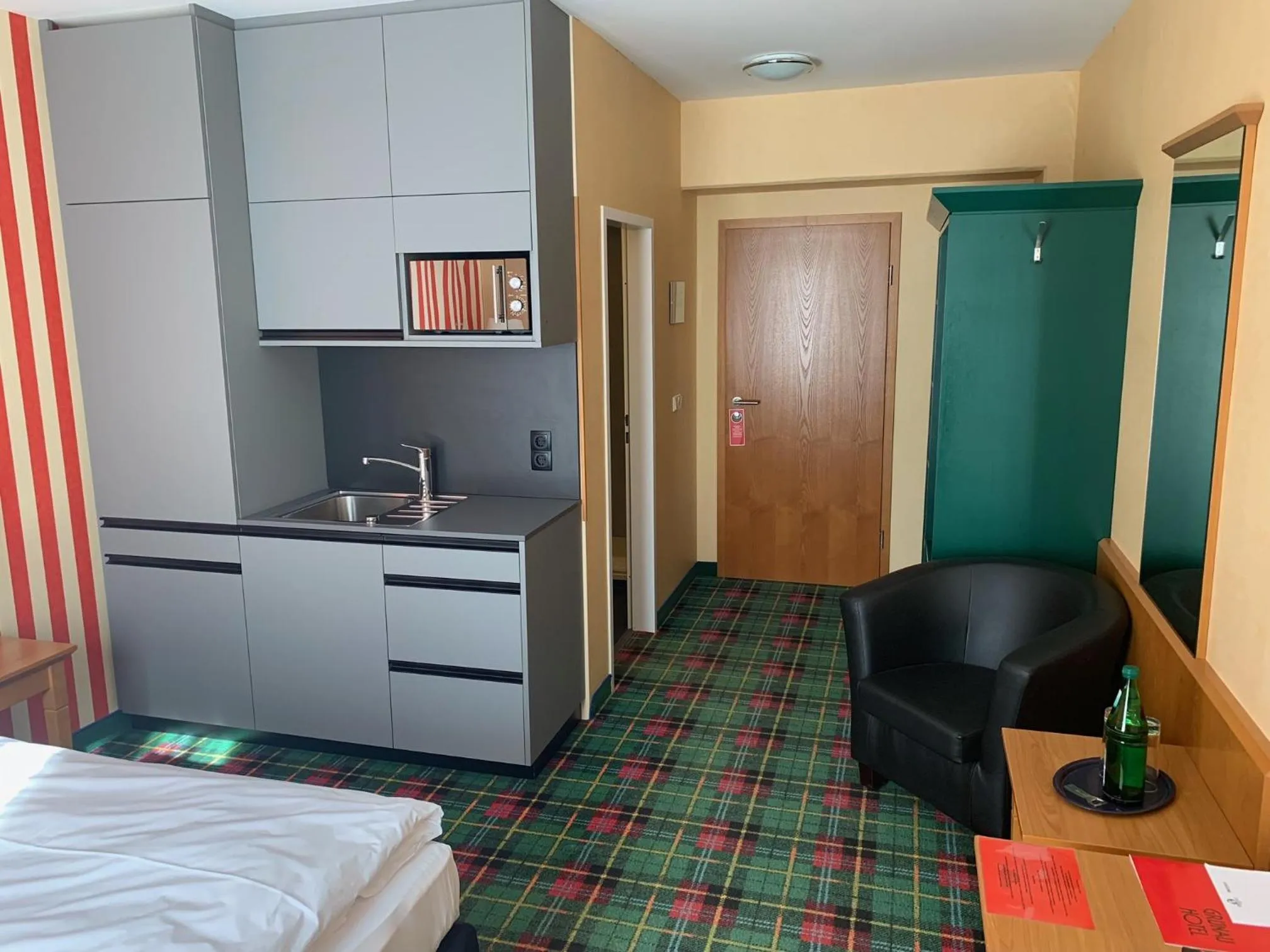 Kitchen or kitchenette, Bed in Grünau Hotel