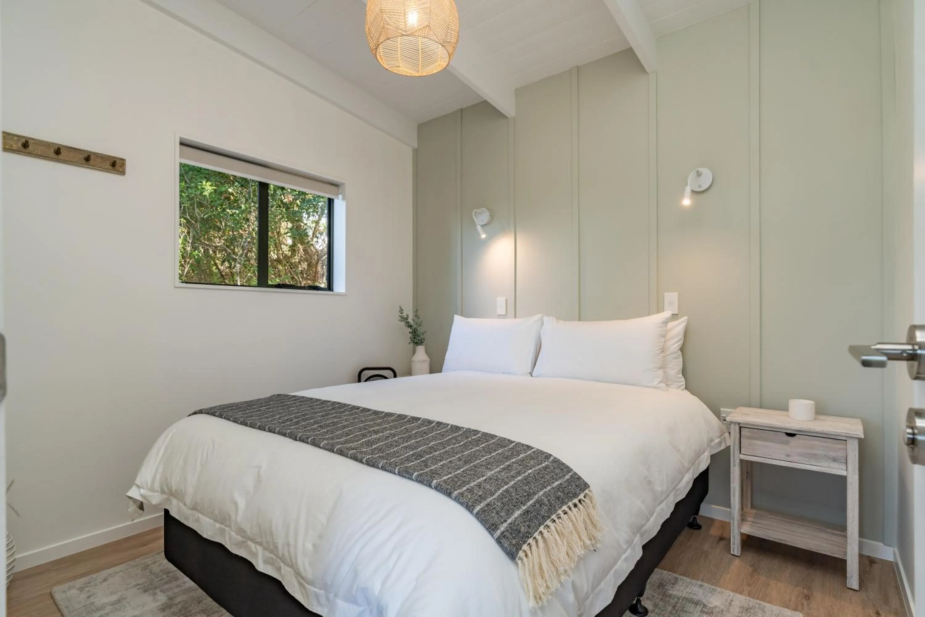 Bed in Tui & Nikau Cabins