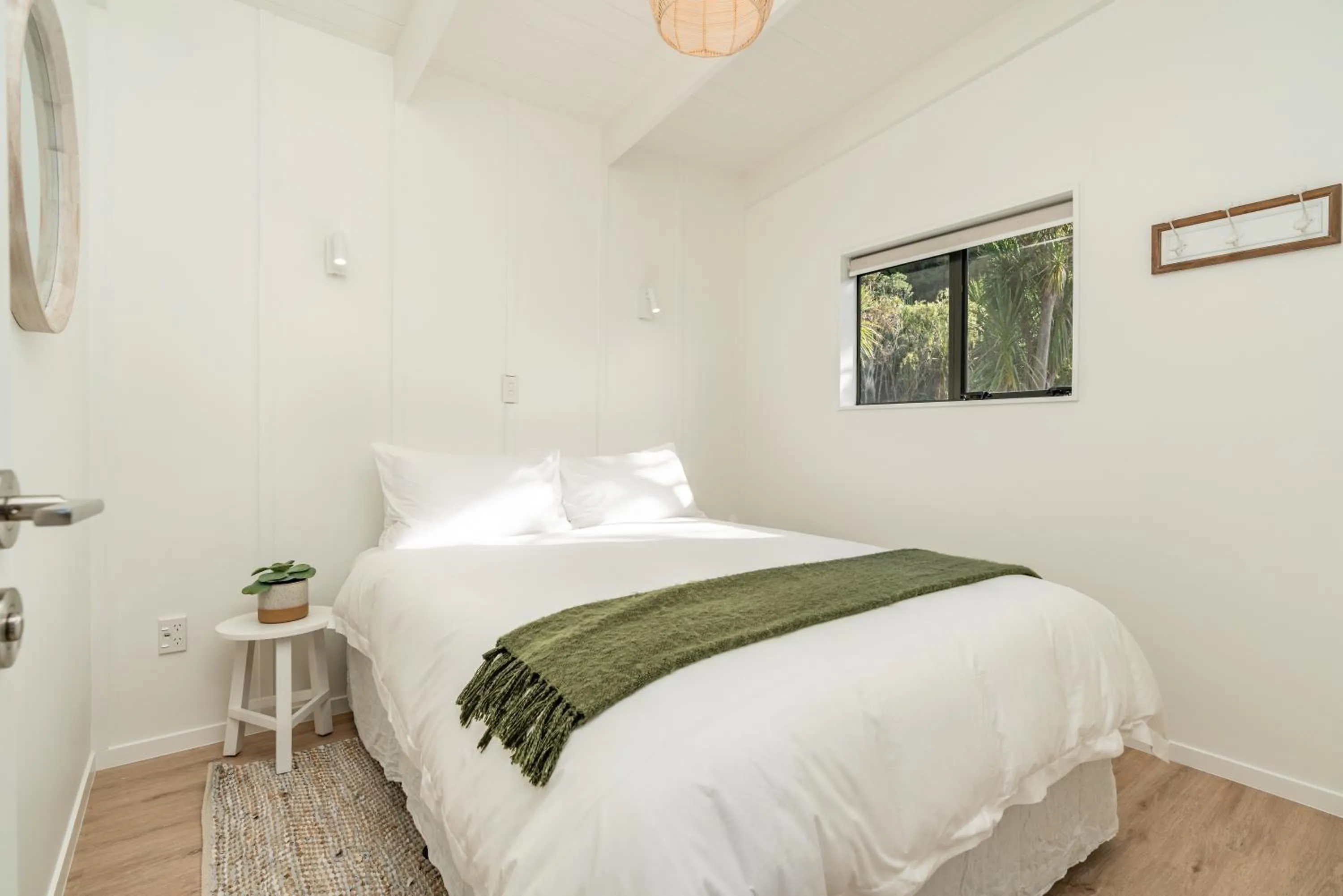 Bed in Tui & Nikau Cabins