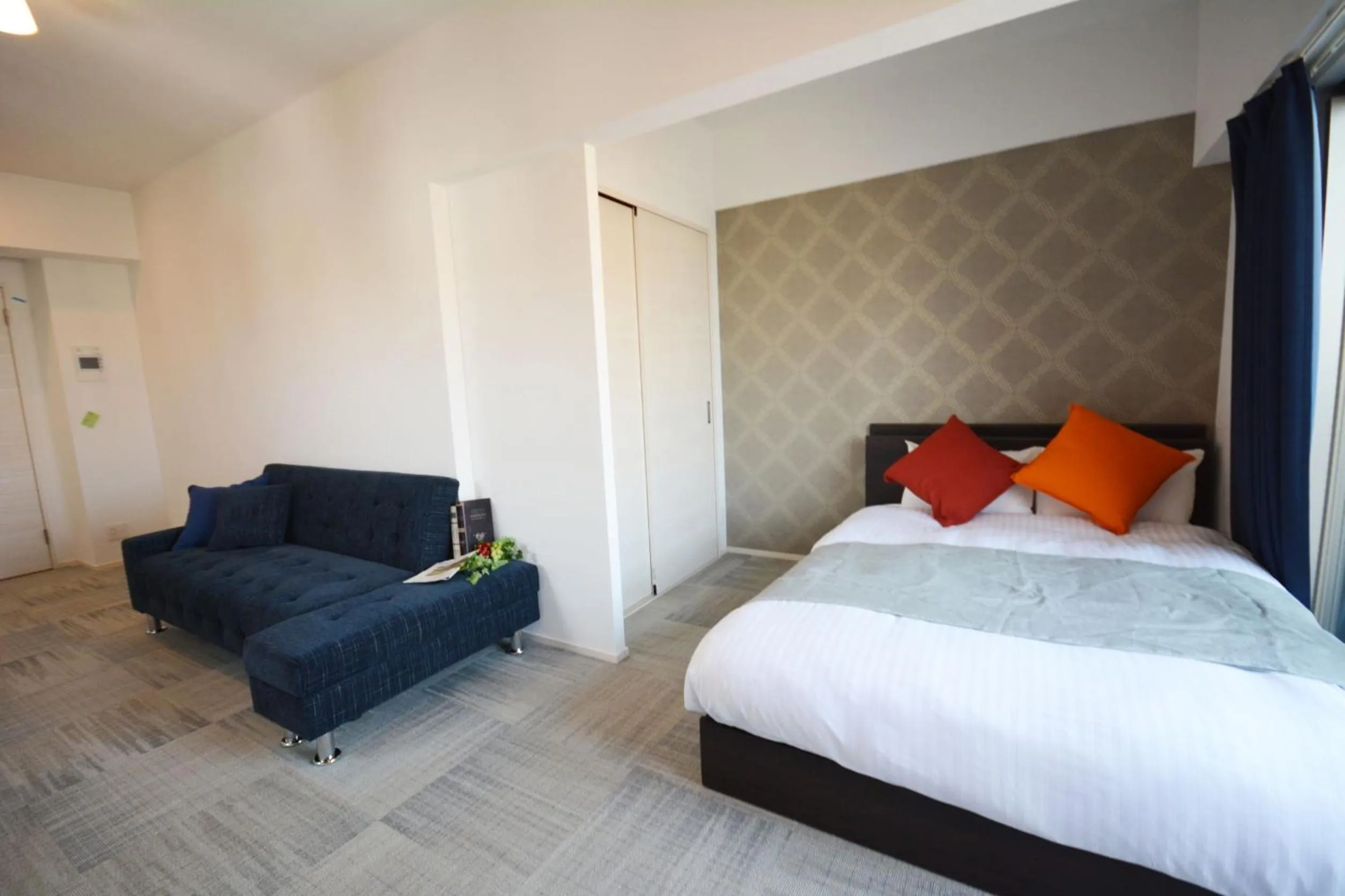 Photo of the whole room, Bed in The Grand Residence Hotel Tenjin