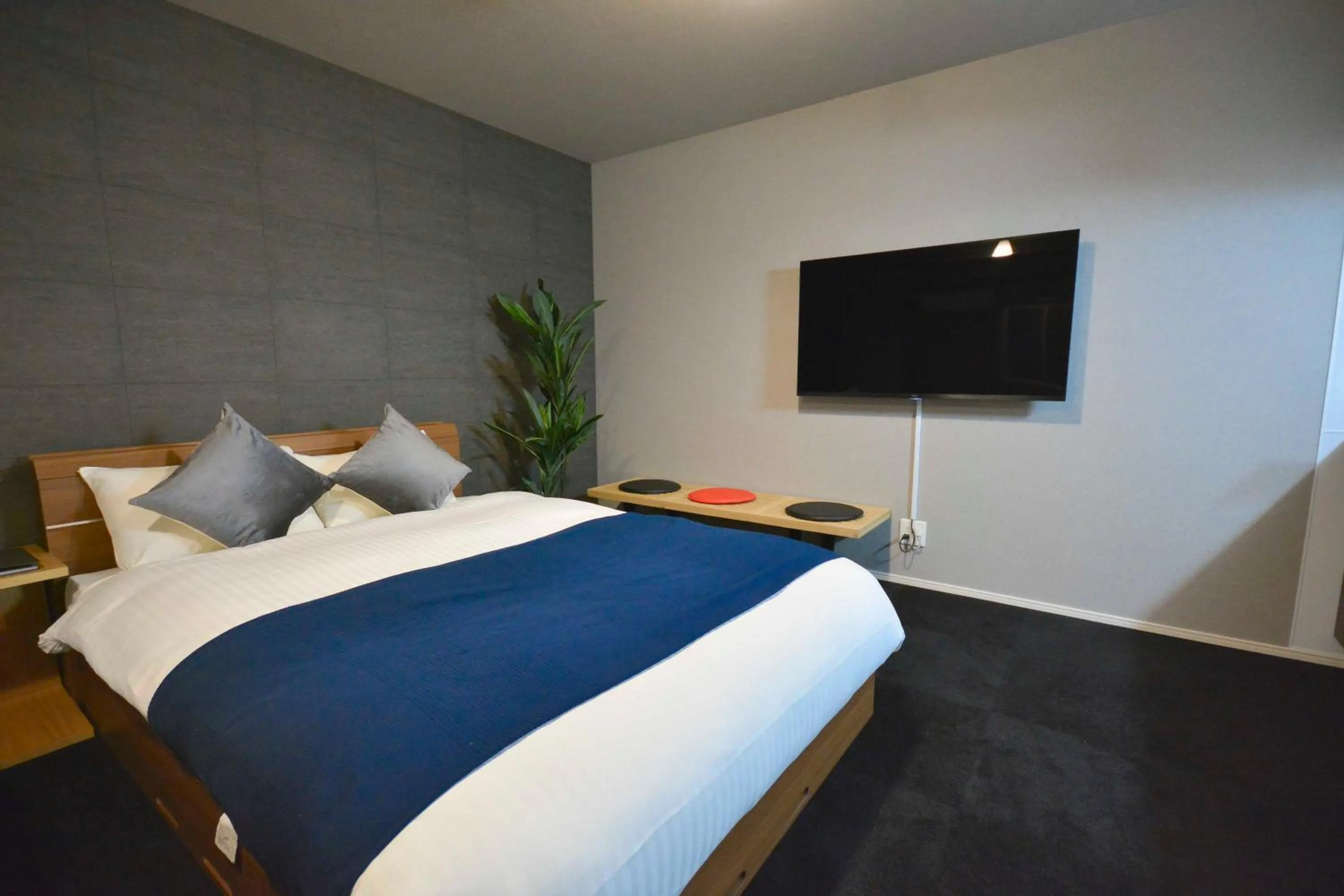 Bed in The Grand Residence Hotel Tenjin