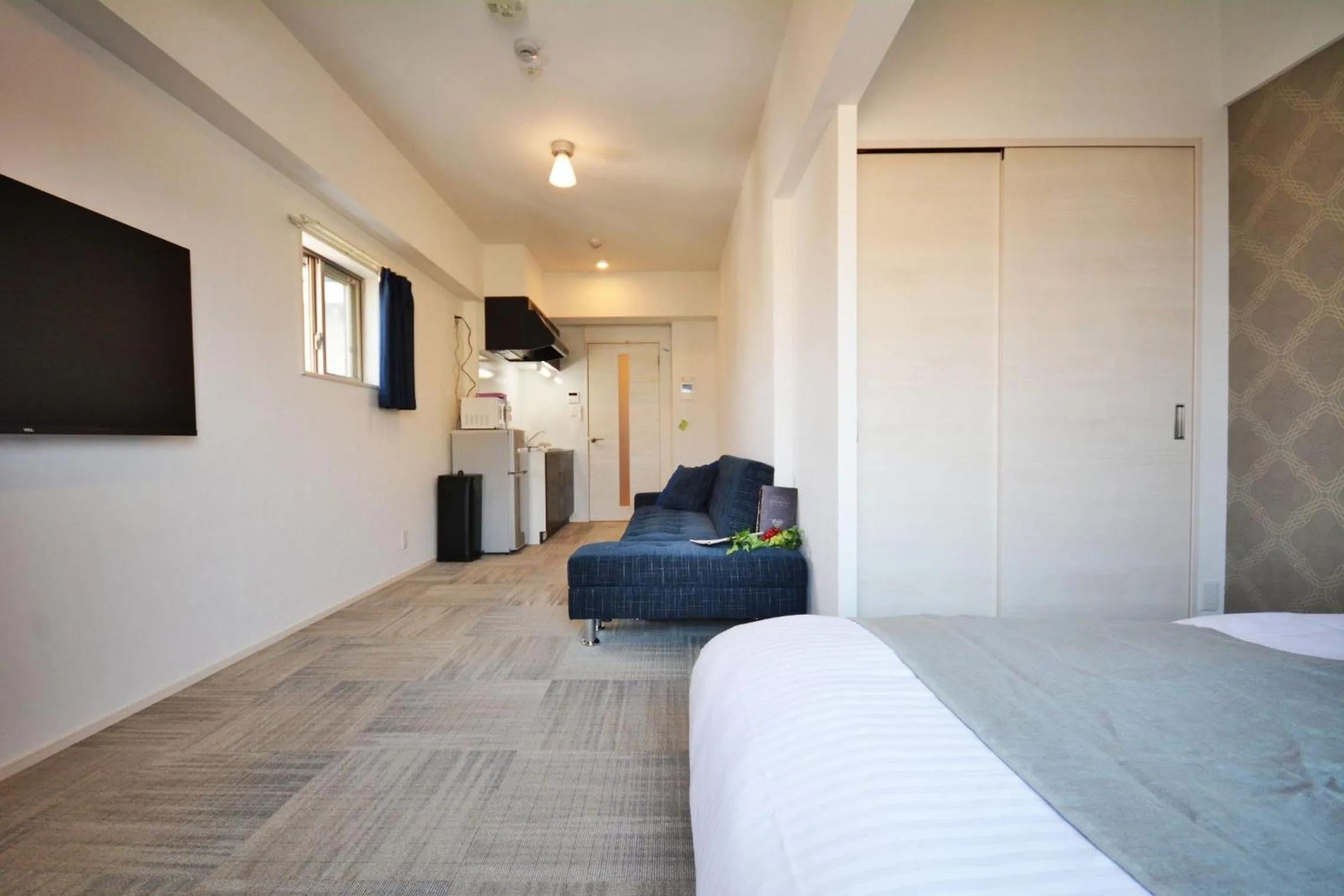 Photo of the whole room, Bed in The Grand Residence Hotel Tenjin