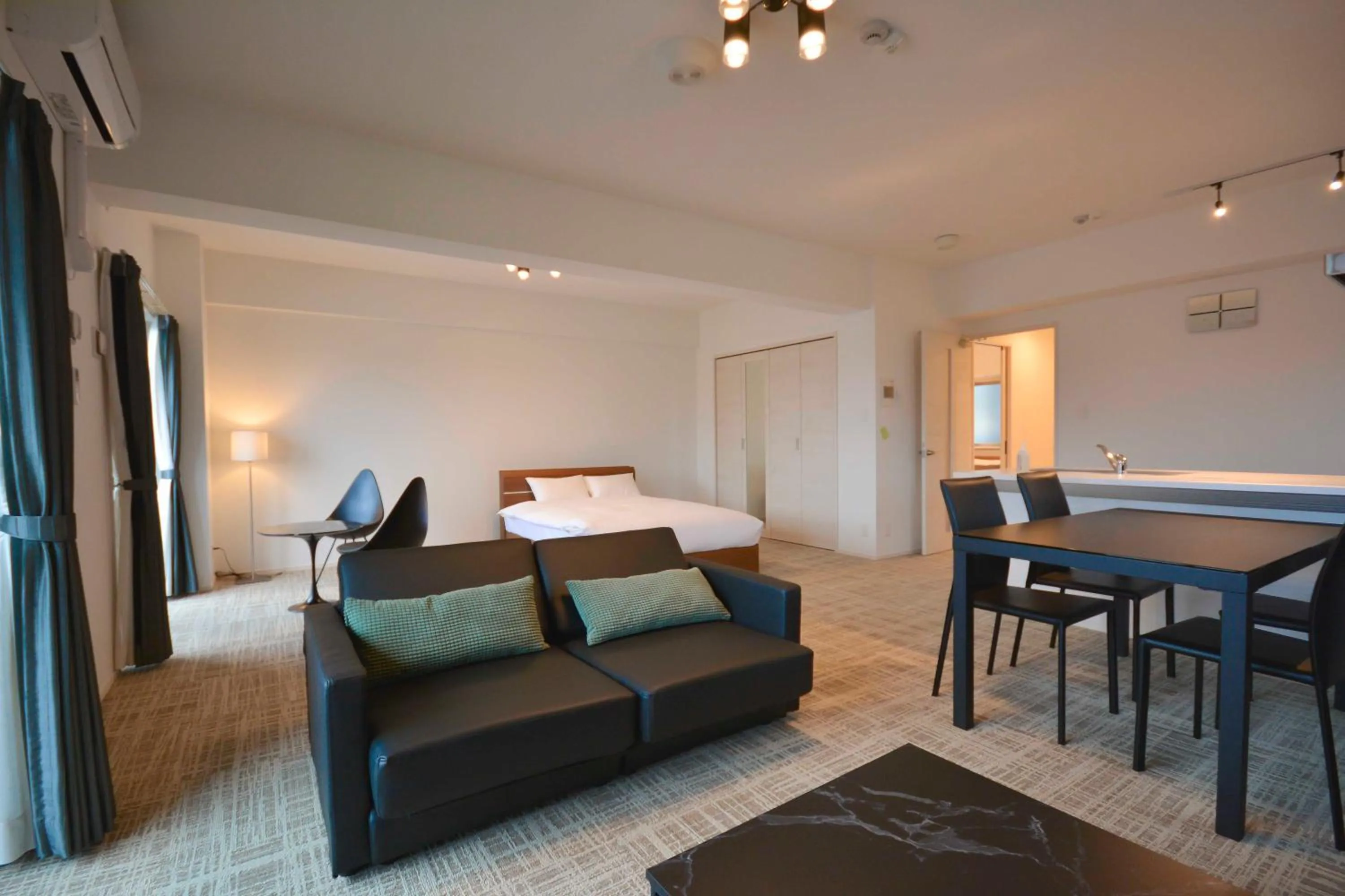 Photo of the whole room, Bed in The Grand Residence Hotel Tenjin