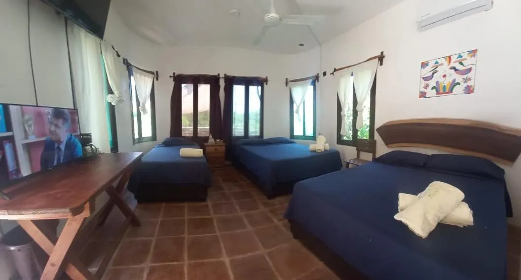 Bed in Hotel Quinto Sol