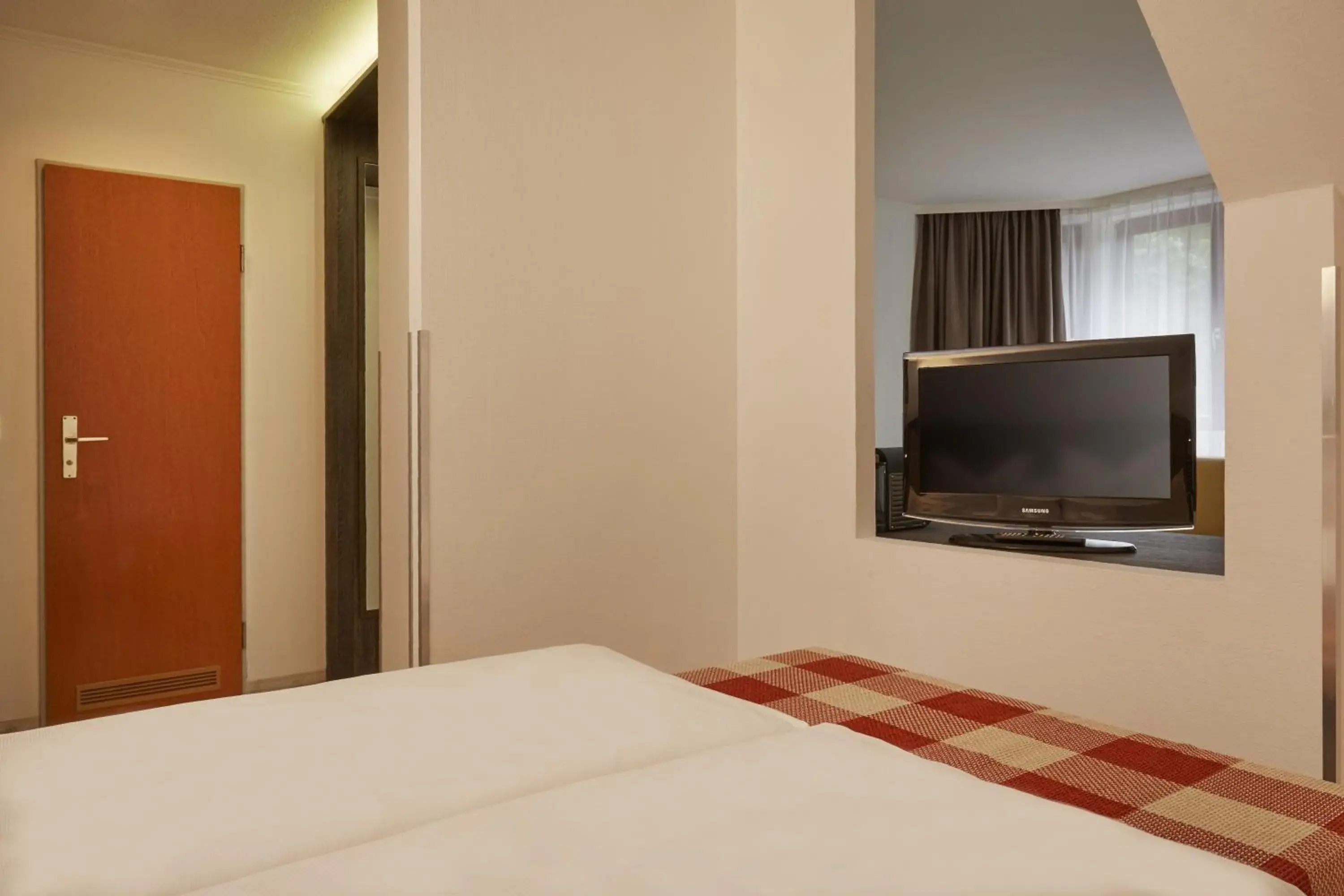 Bedroom, Bed in H+ Hotel Nürnberg Bedroom, Bed in H+ Hotel Nürnberg