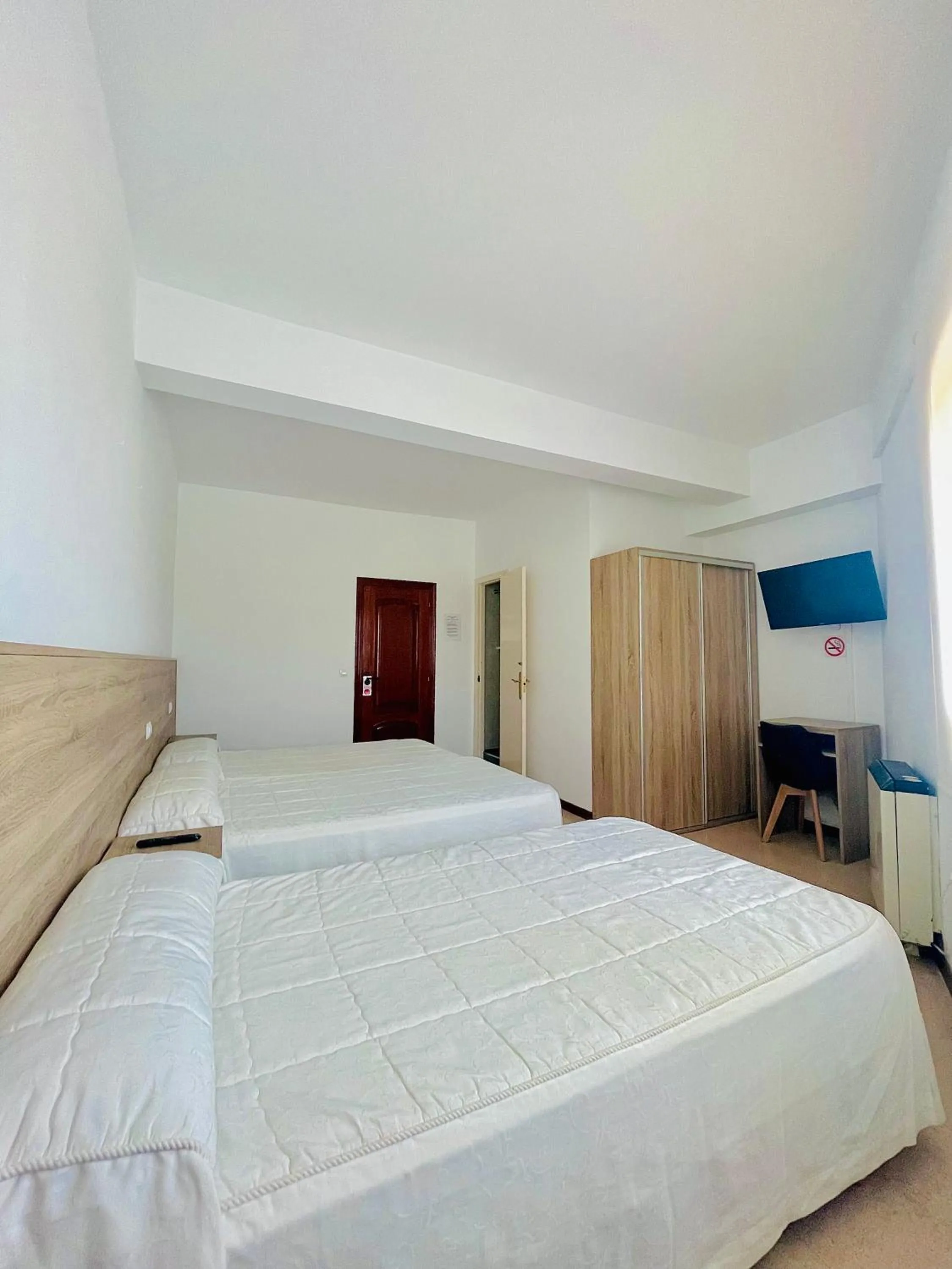 Bed in Pensión Costiña