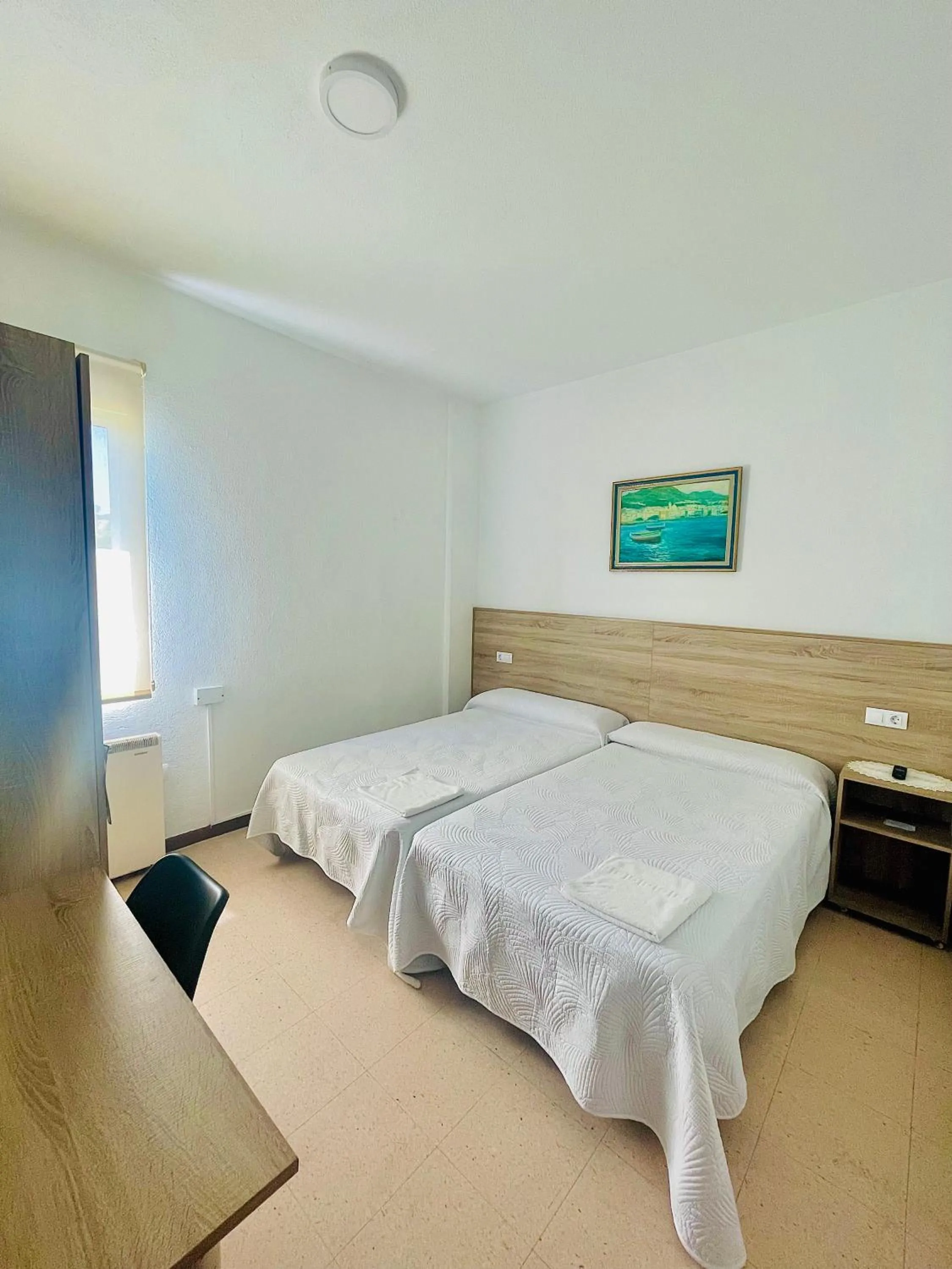 Bed in Pensión Costiña