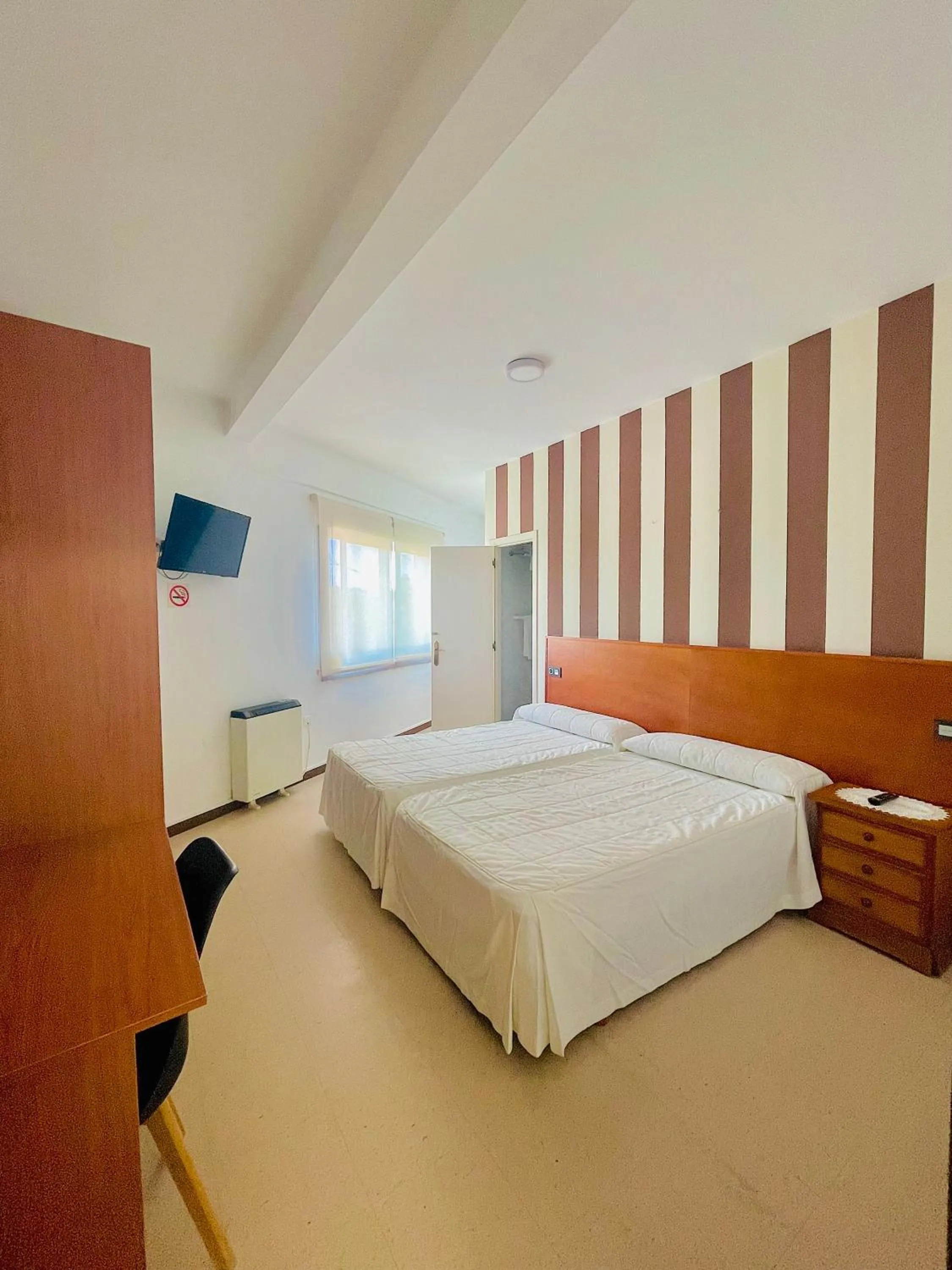 Bed in Pensión Costiña