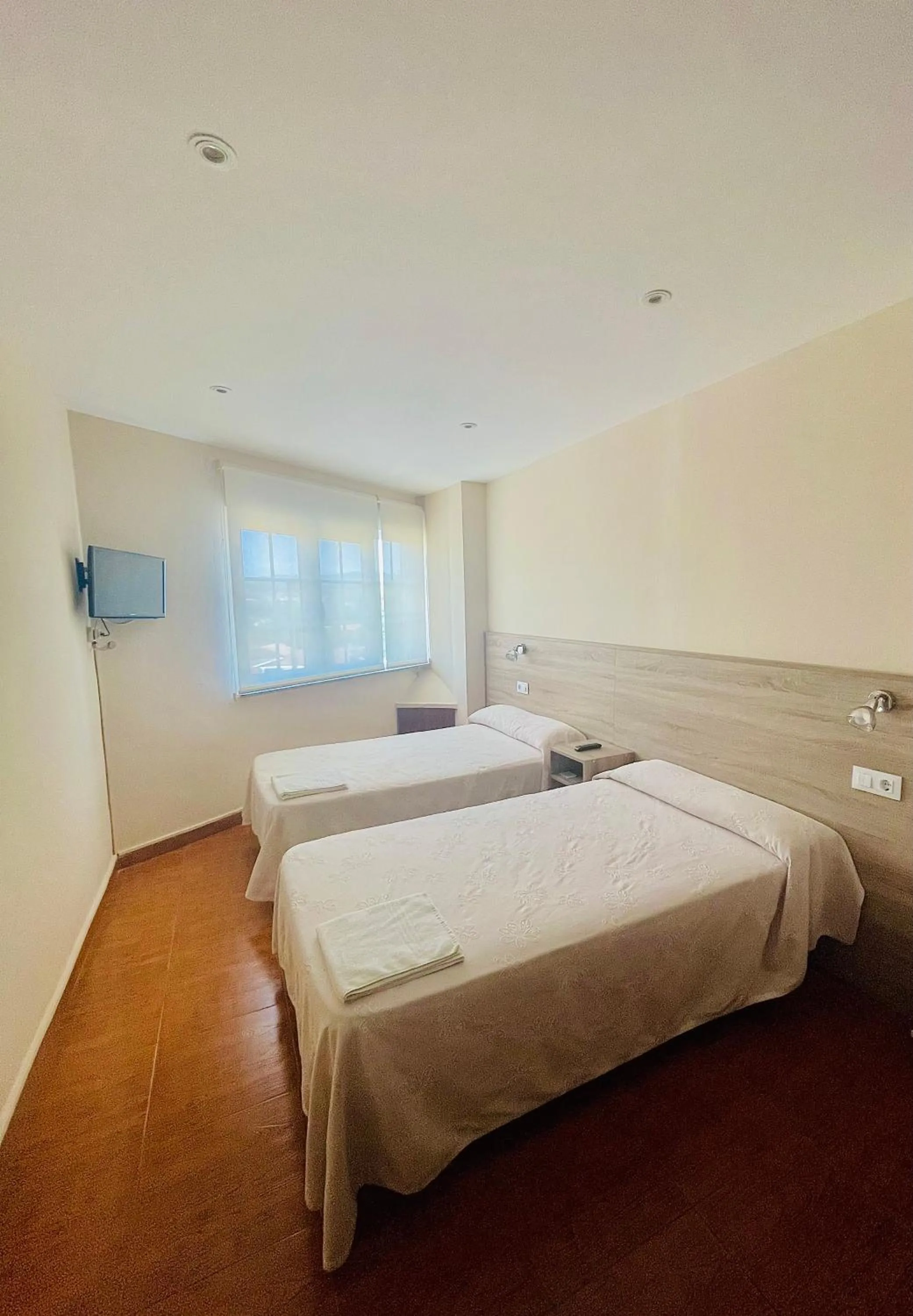 Bed in Pensión Costiña