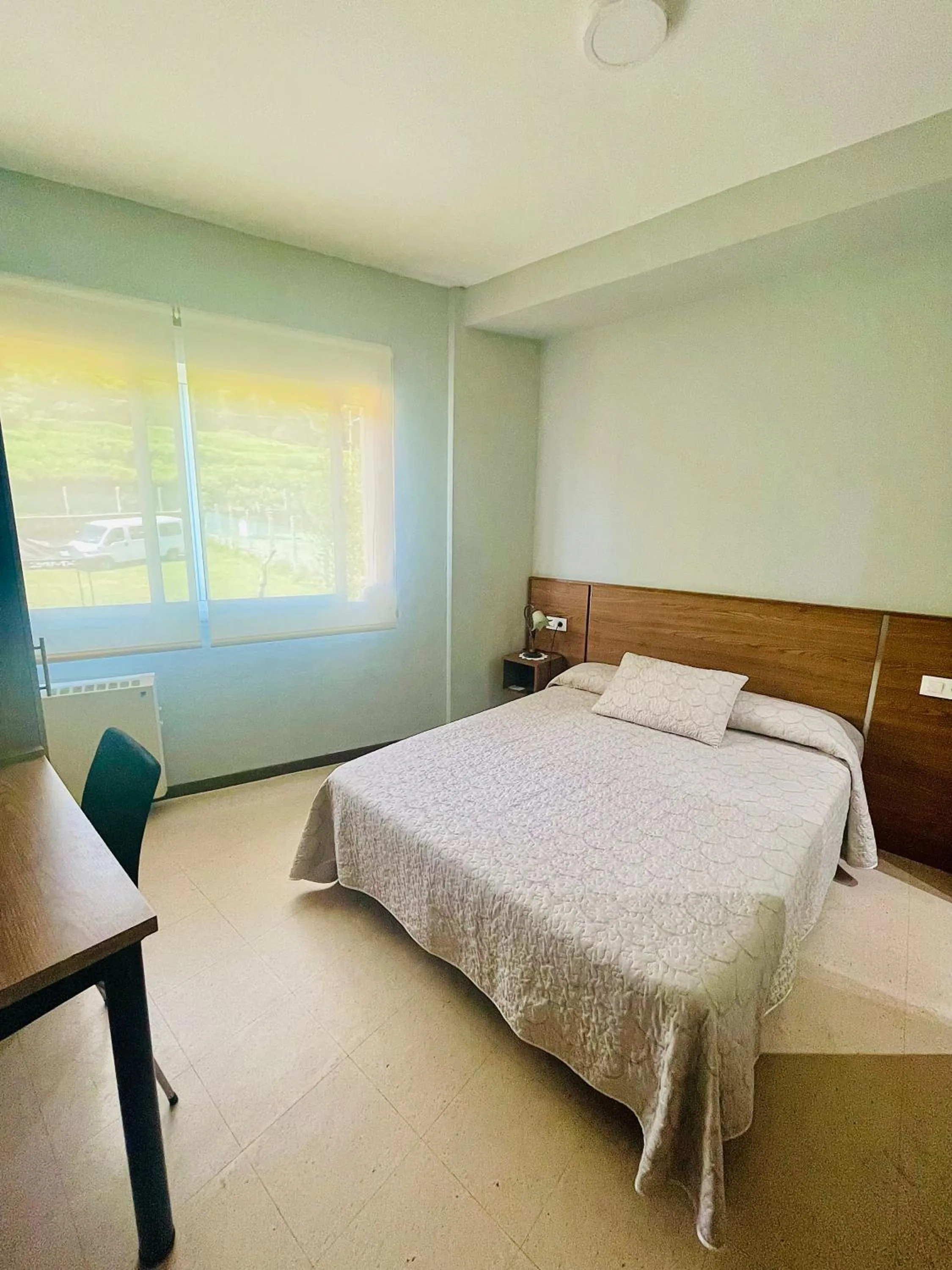 Bed in Pensión Costiña