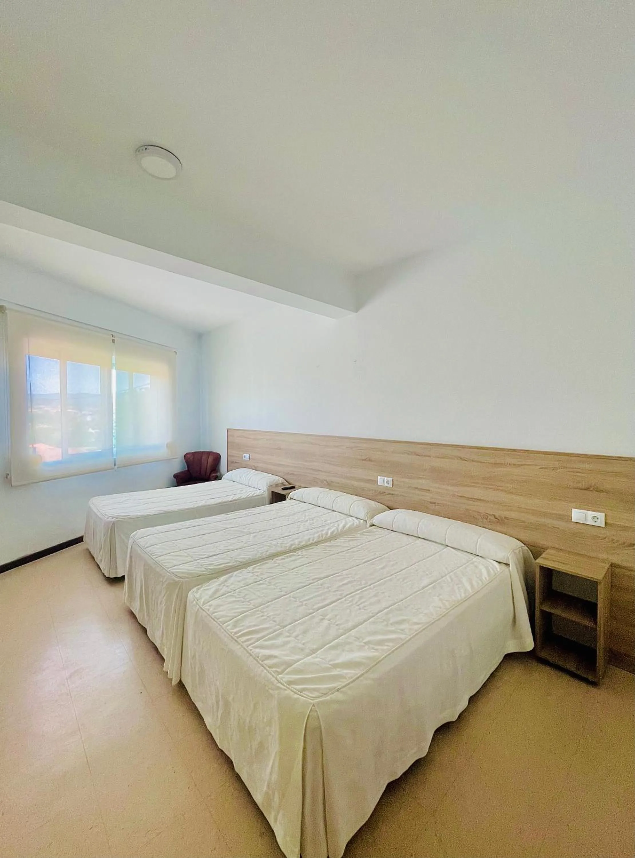 Bed in Pensión Costiña