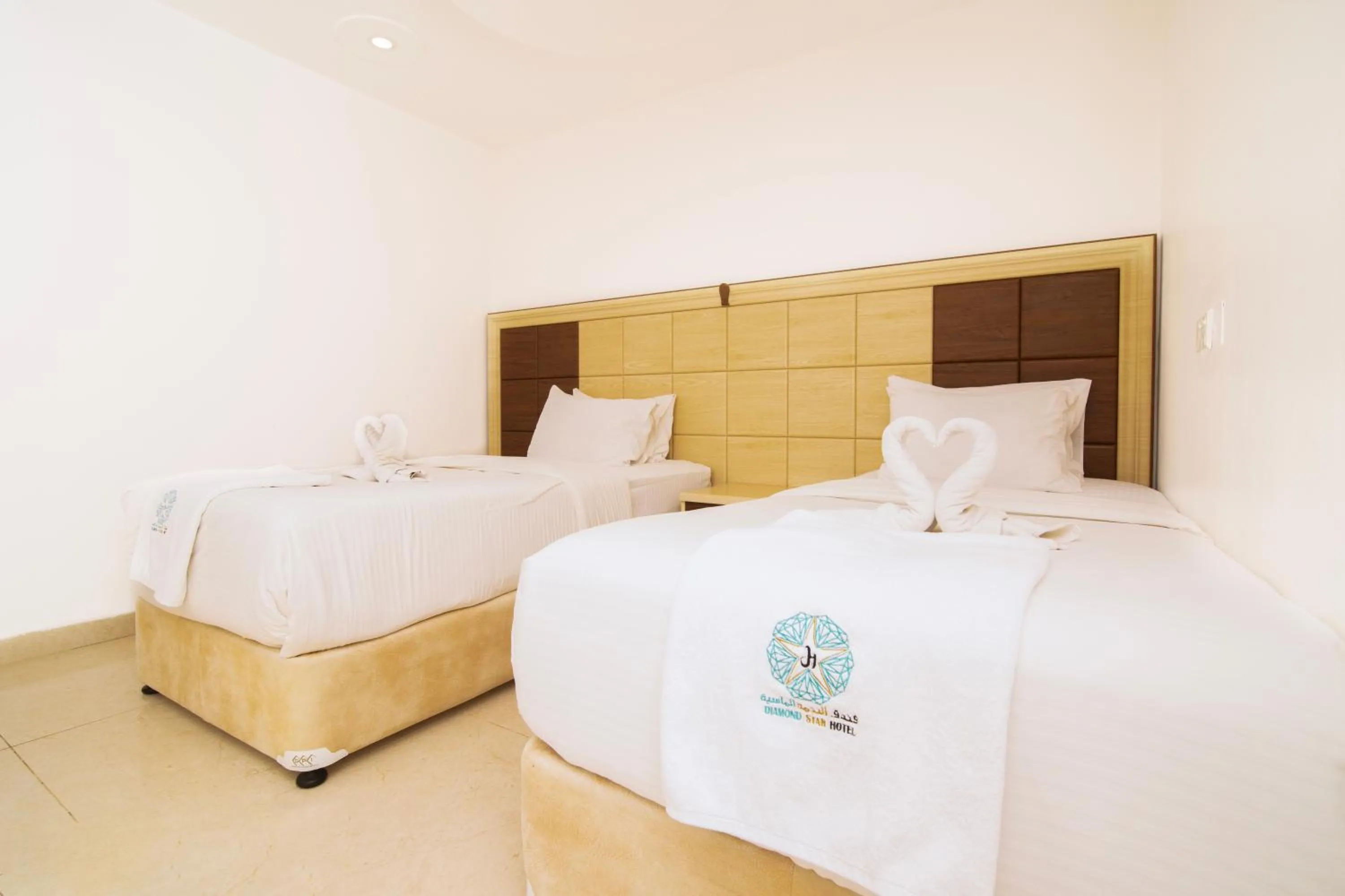 Bed in Diamond Star Hotel فندق النجمة الماسية