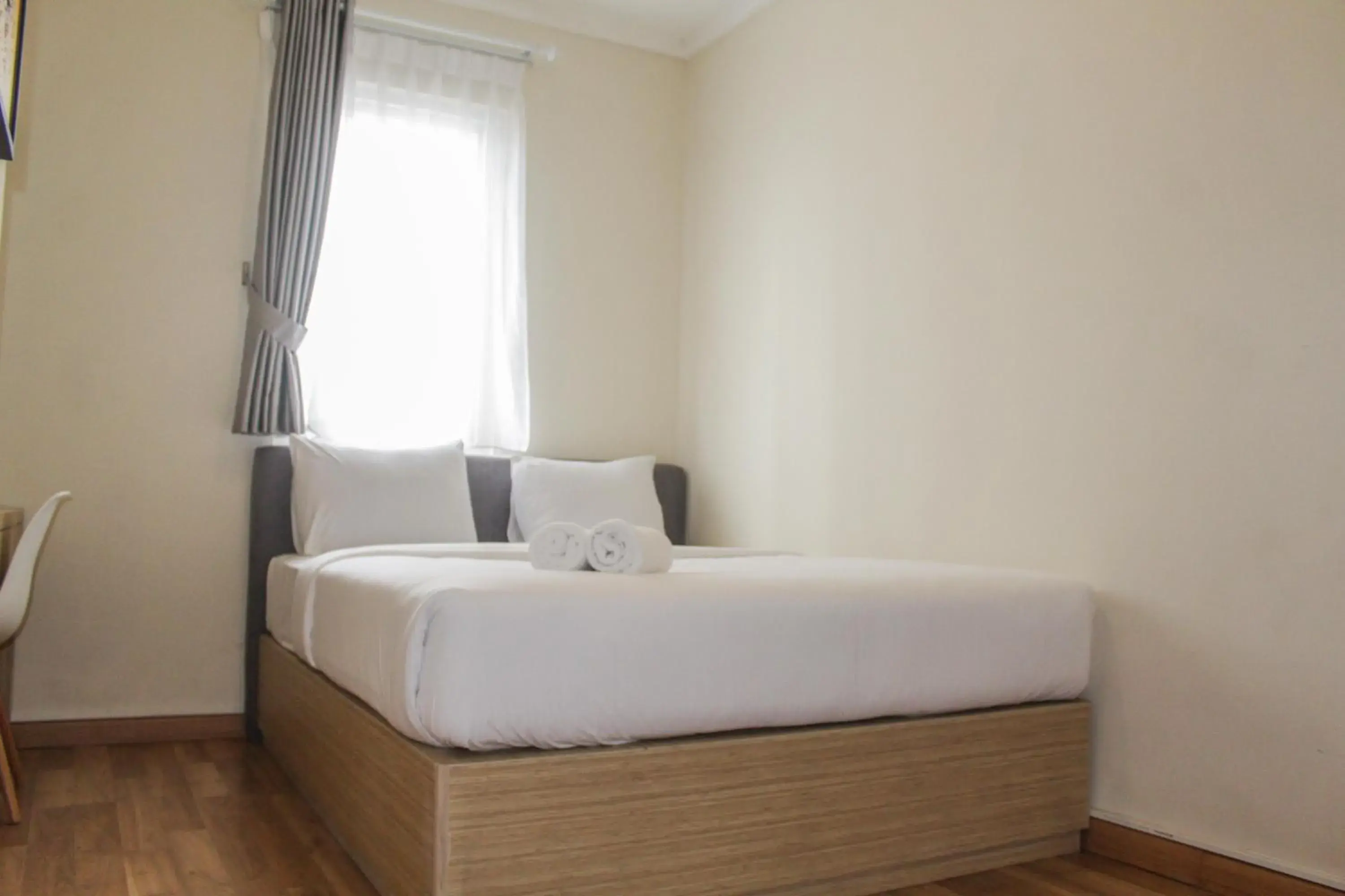 Bed in Homey 2BR Apartment at Grand Palace Kemayoran By Travelio Bed in Homey 2BR Apartment at Grand Palace Kemayoran By Travelio