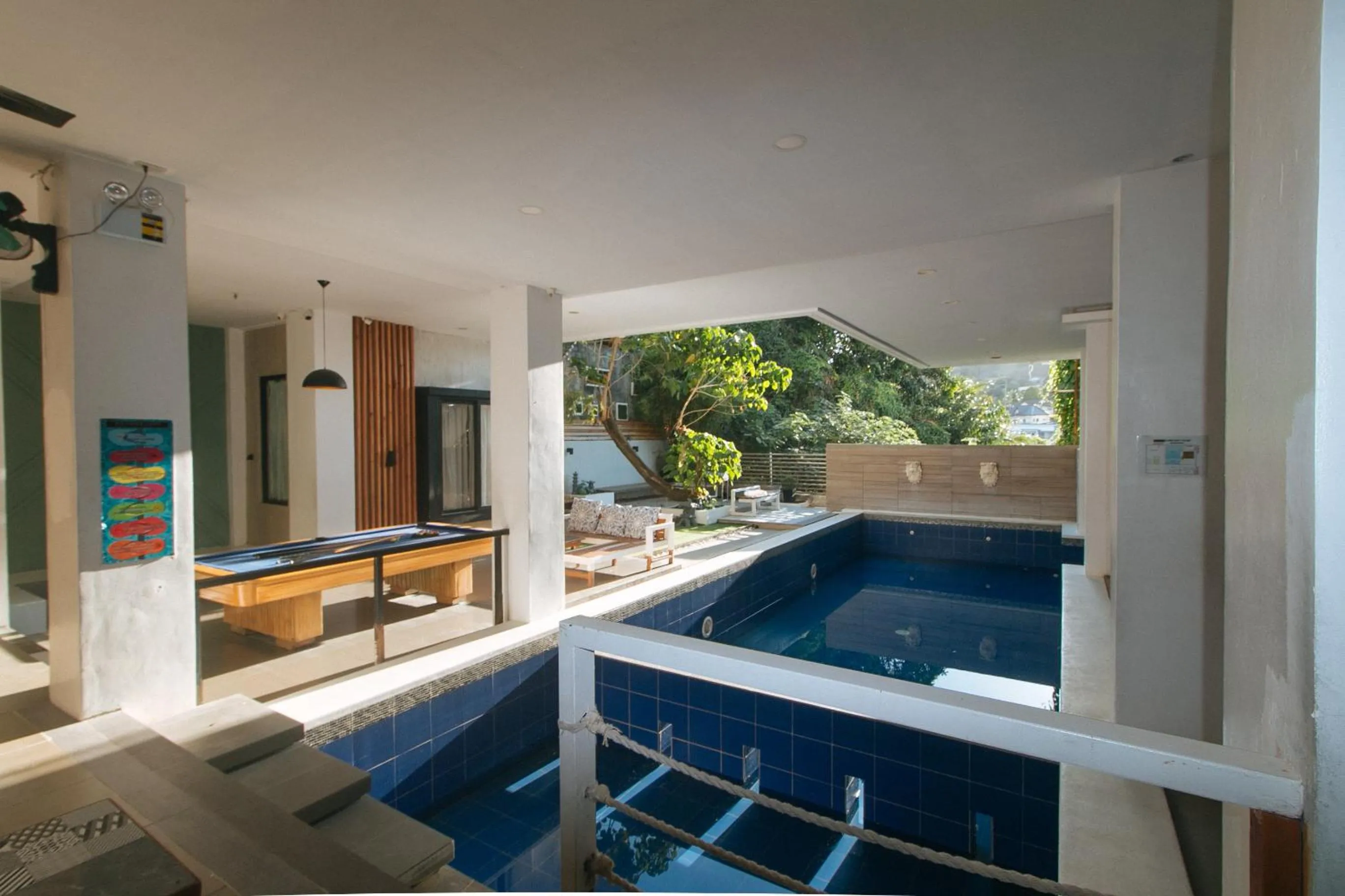 Swimming pool in RedDoorz at Anton's Loft Designer Resort Pansol Calamba Laguna