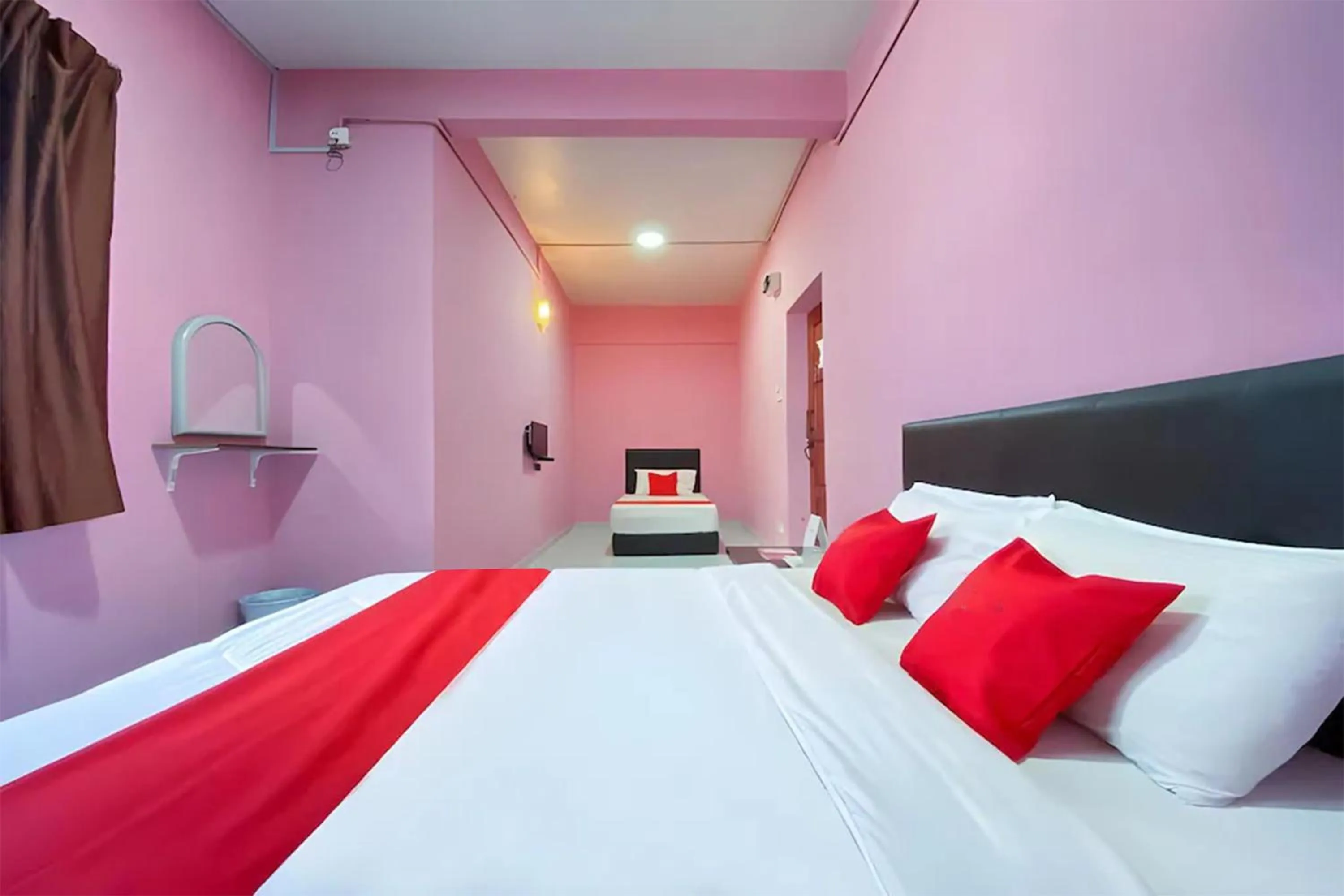Bed in Coop Hotel Kangar