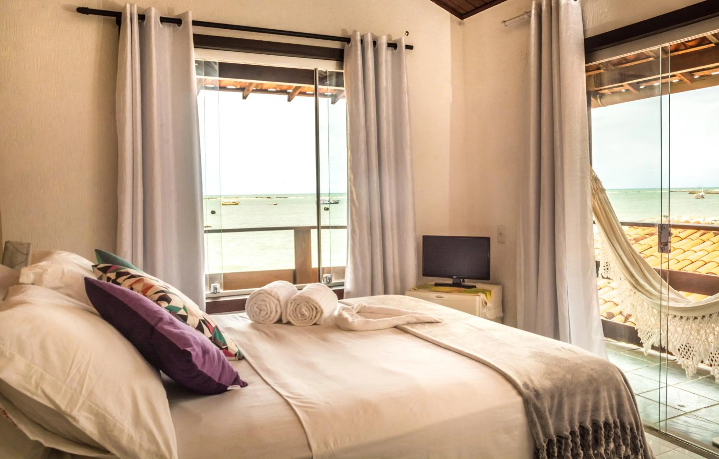 Bed in Pousada Grauçá