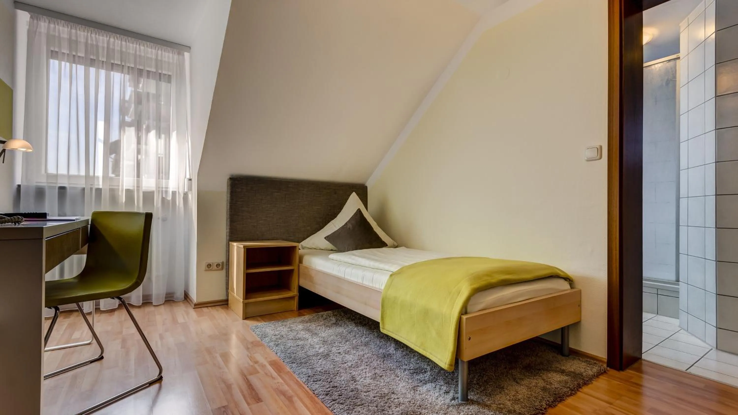 Decorative detail, Bed in Hotel Restaurant Weihenstephaner Stuben