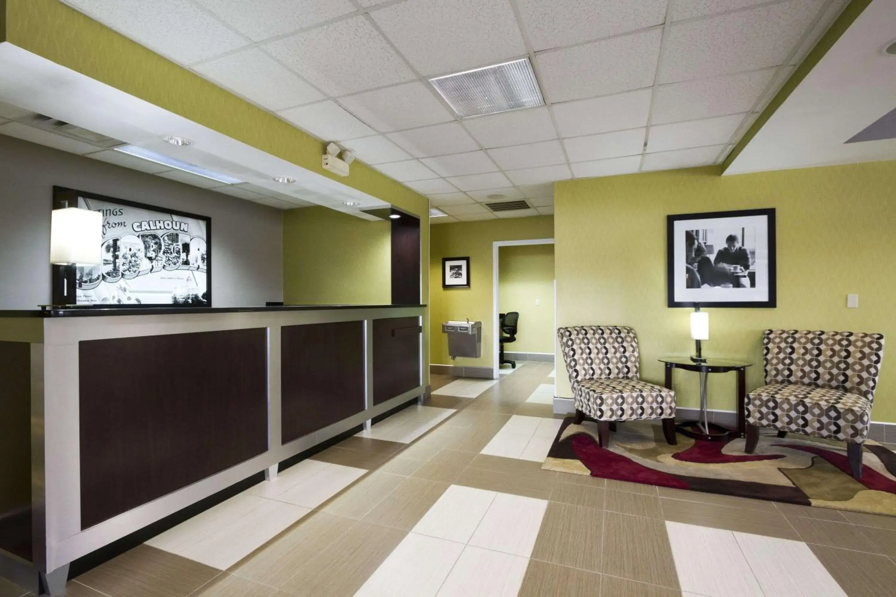 Lobby or reception in Super 8 by Wyndham Calhoun Lobby or reception in Super 8 by Wyndham Calhoun