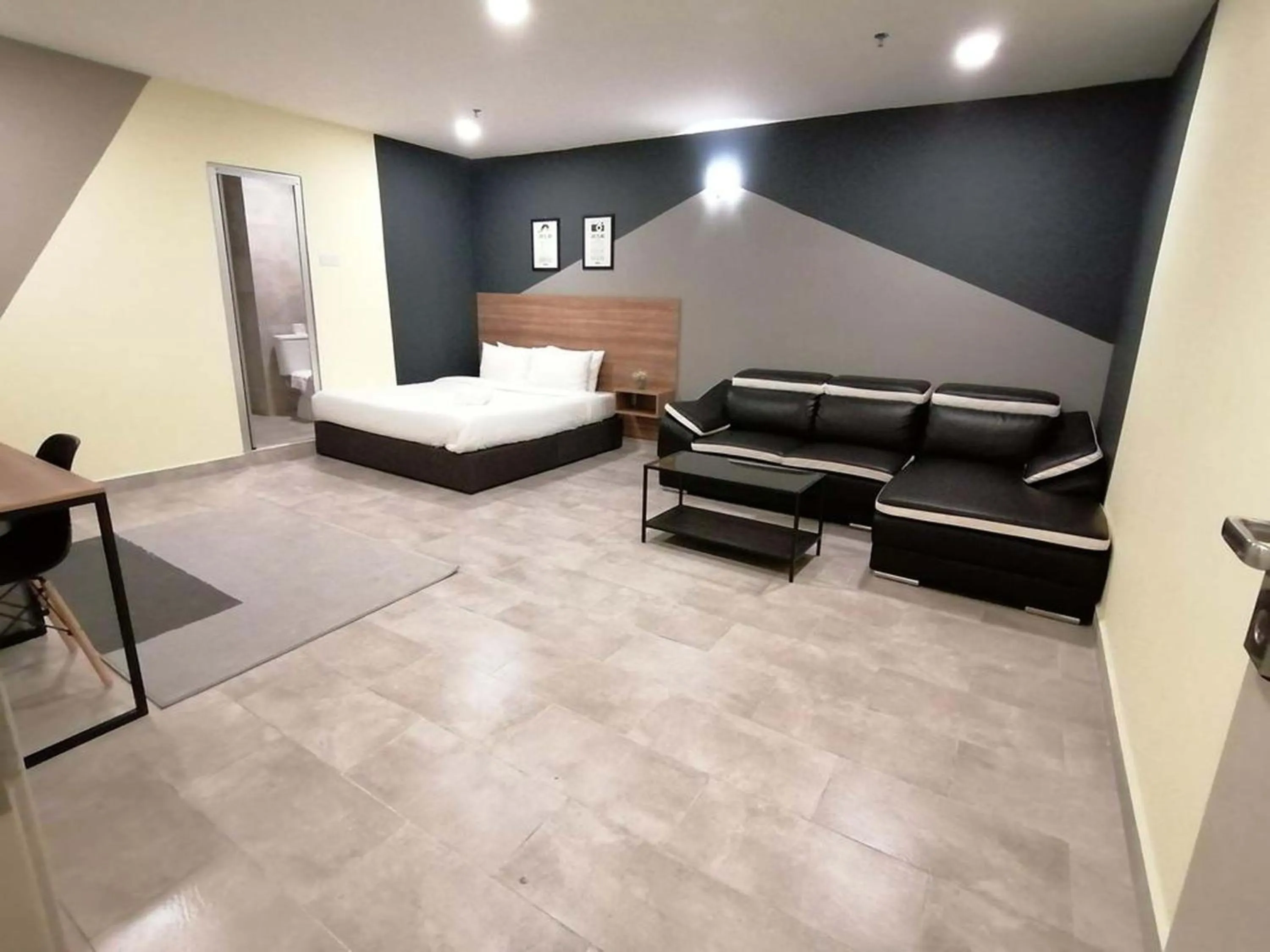 Living room, Bed in T-hotel Mont Kiara