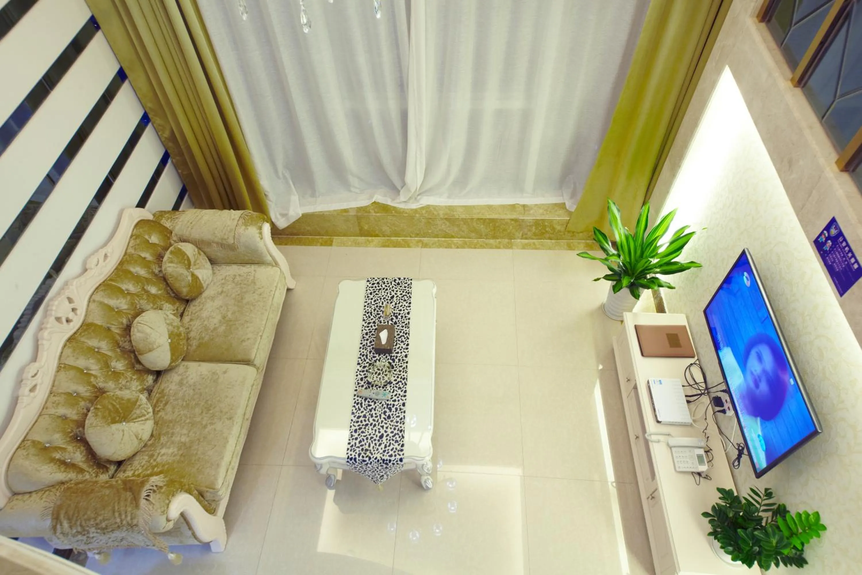 Living room in Louidon Mega Apartment Of Kam Rueng Plaza - Sunshine Apartment