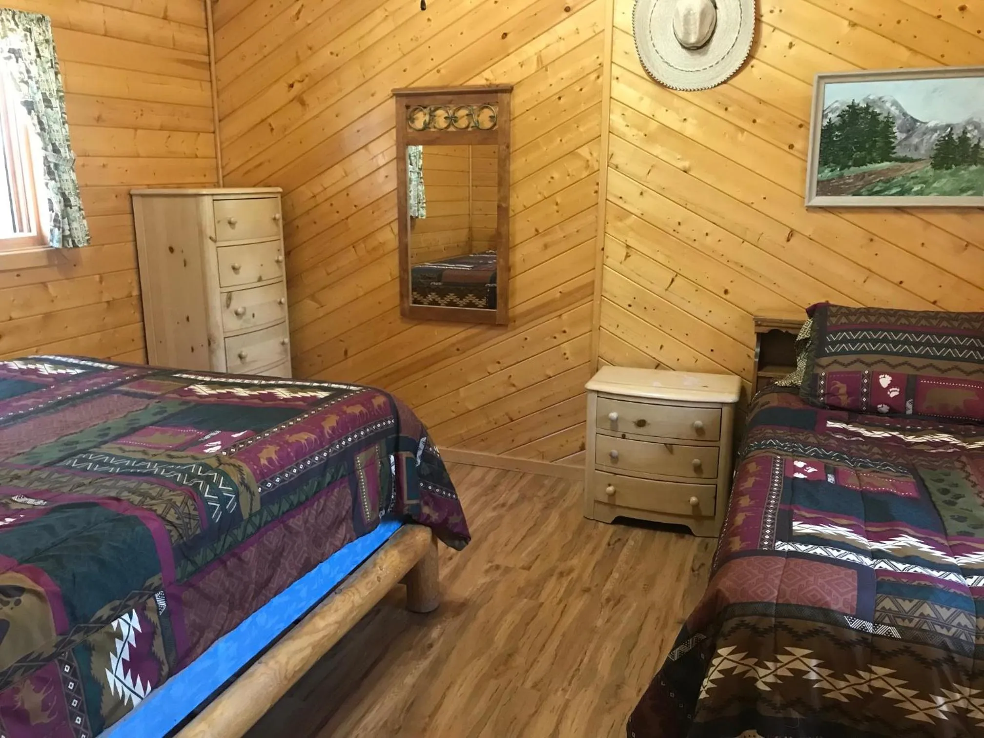 Bed in Grandview Cabins & RV Resort