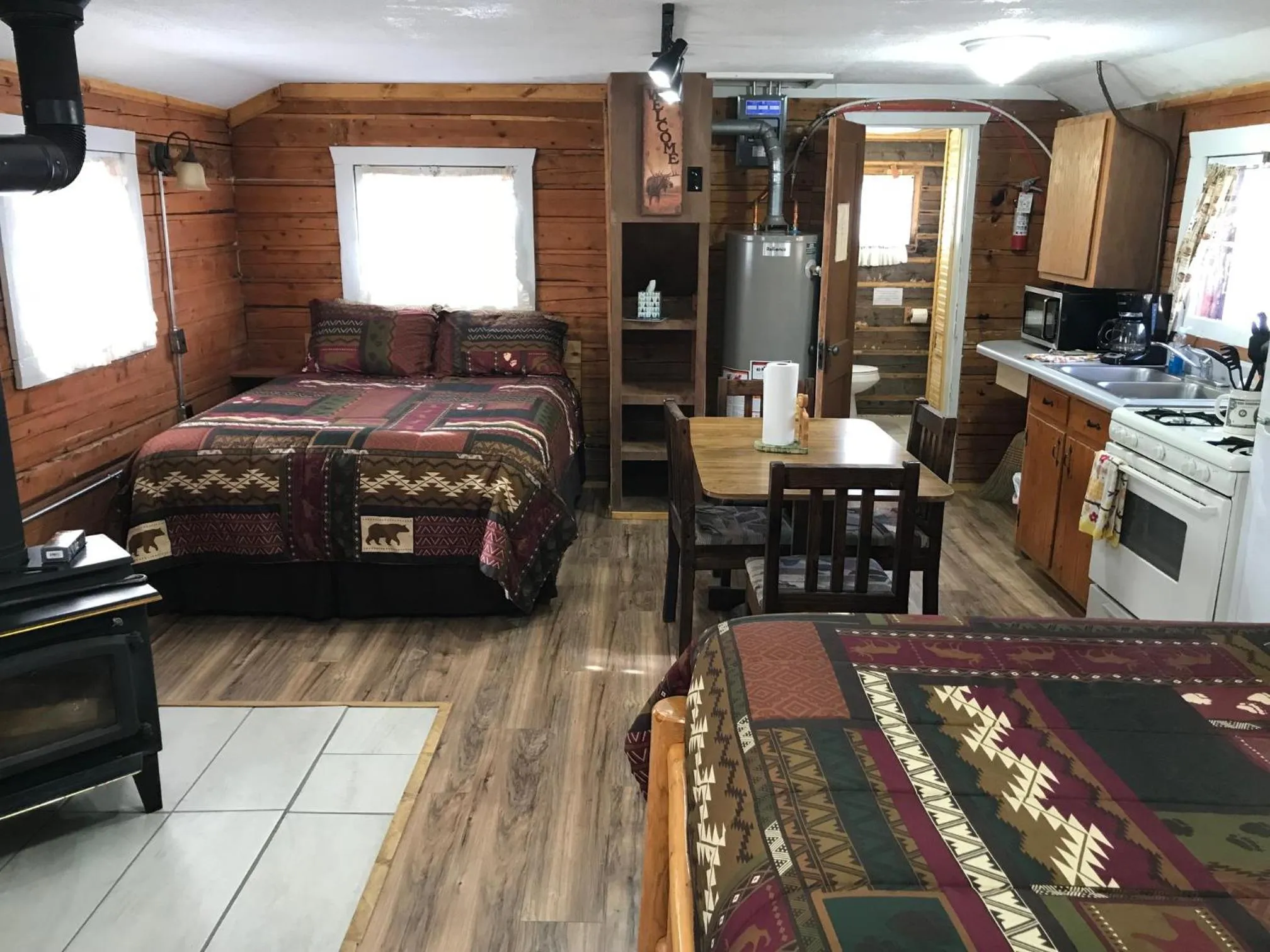 Bed in Grandview Cabins & RV Resort