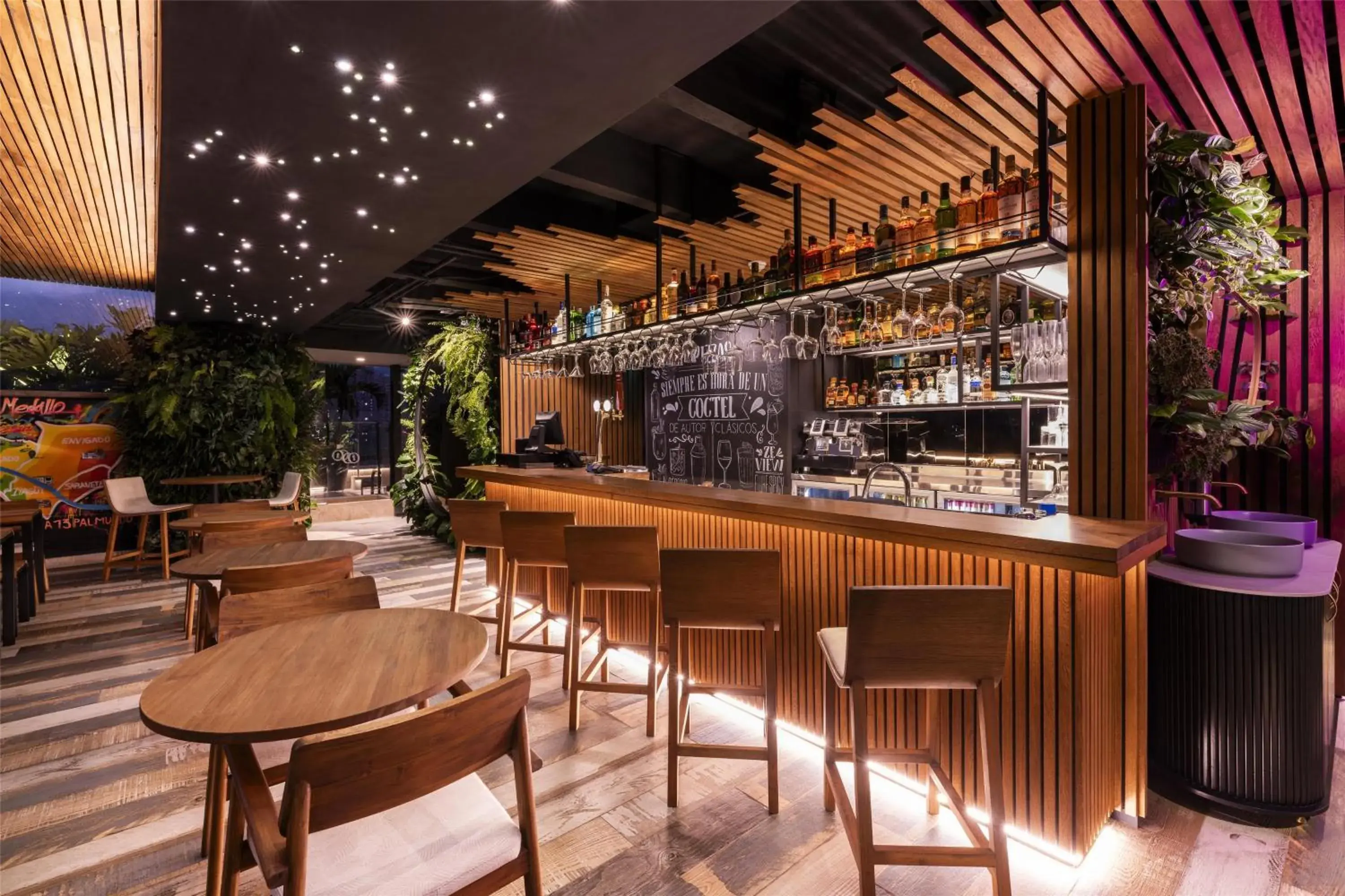 Lounge or bar in York Medellin, Curio Collection by Hilton Lounge or bar in York Medellin, Curio Collection by Hilton