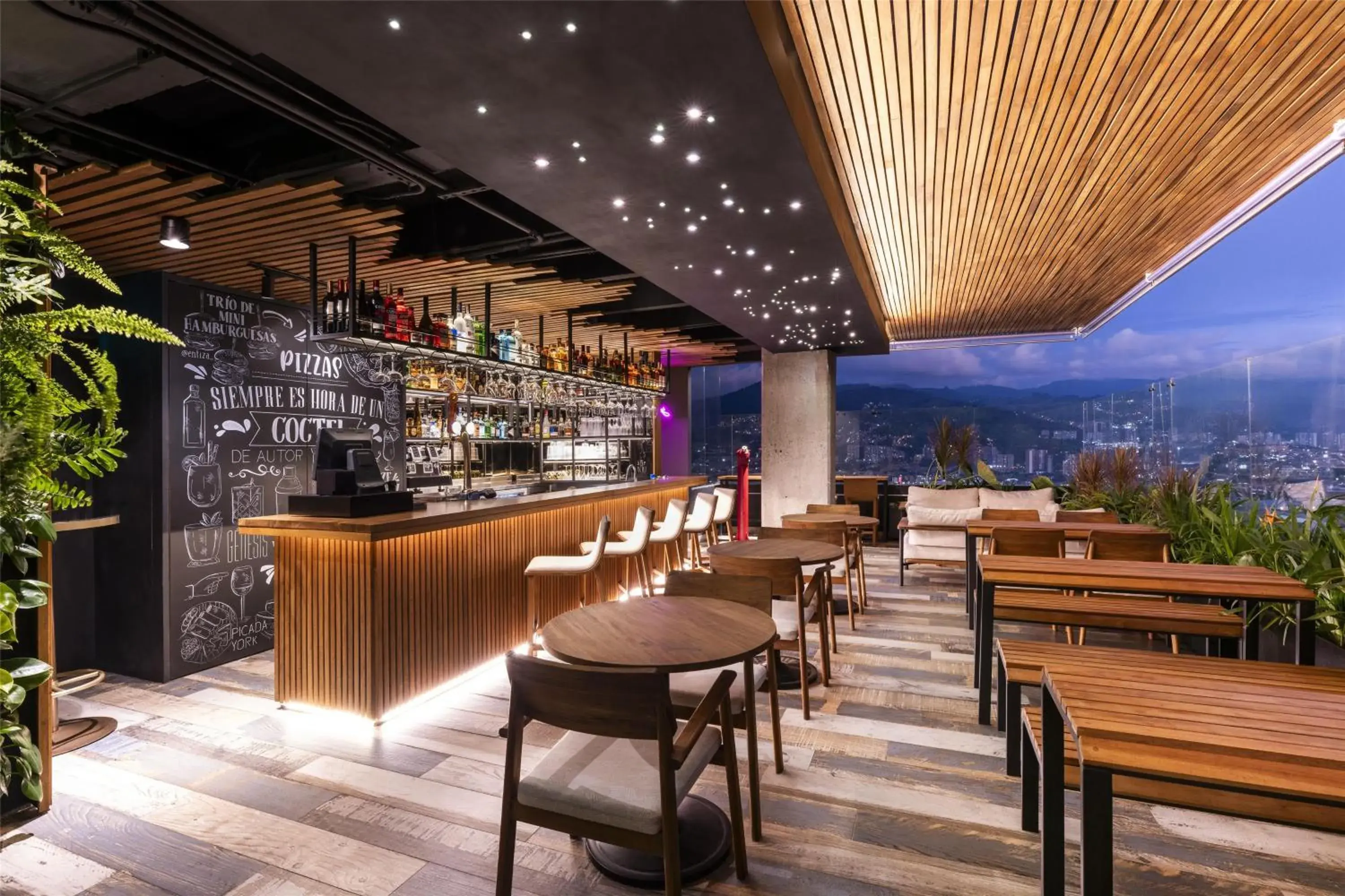 Lounge or bar in York Medellin, Curio Collection by Hilton Lounge or bar in York Medellin, Curio Collection by Hilton