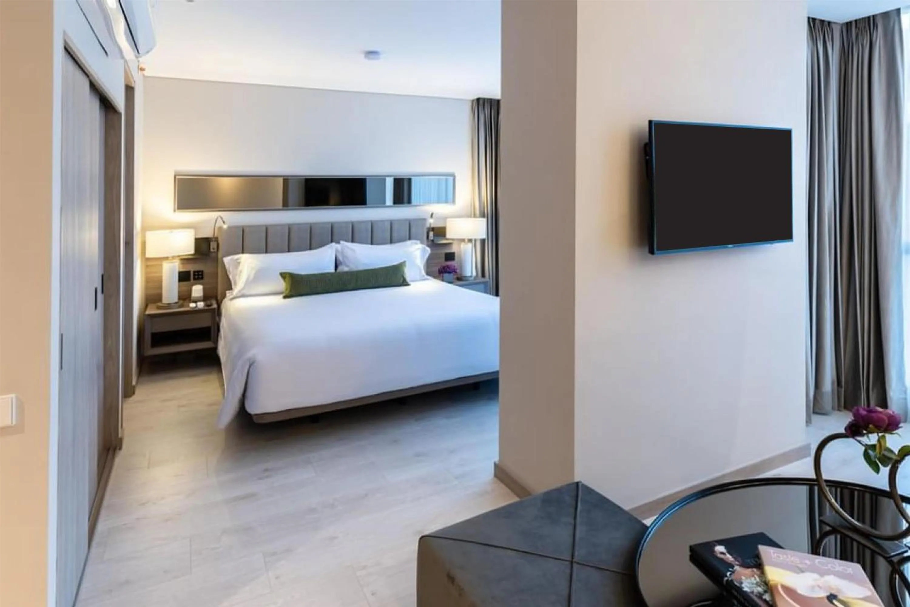 Bed in York Medellin, Curio Collection by Hilton