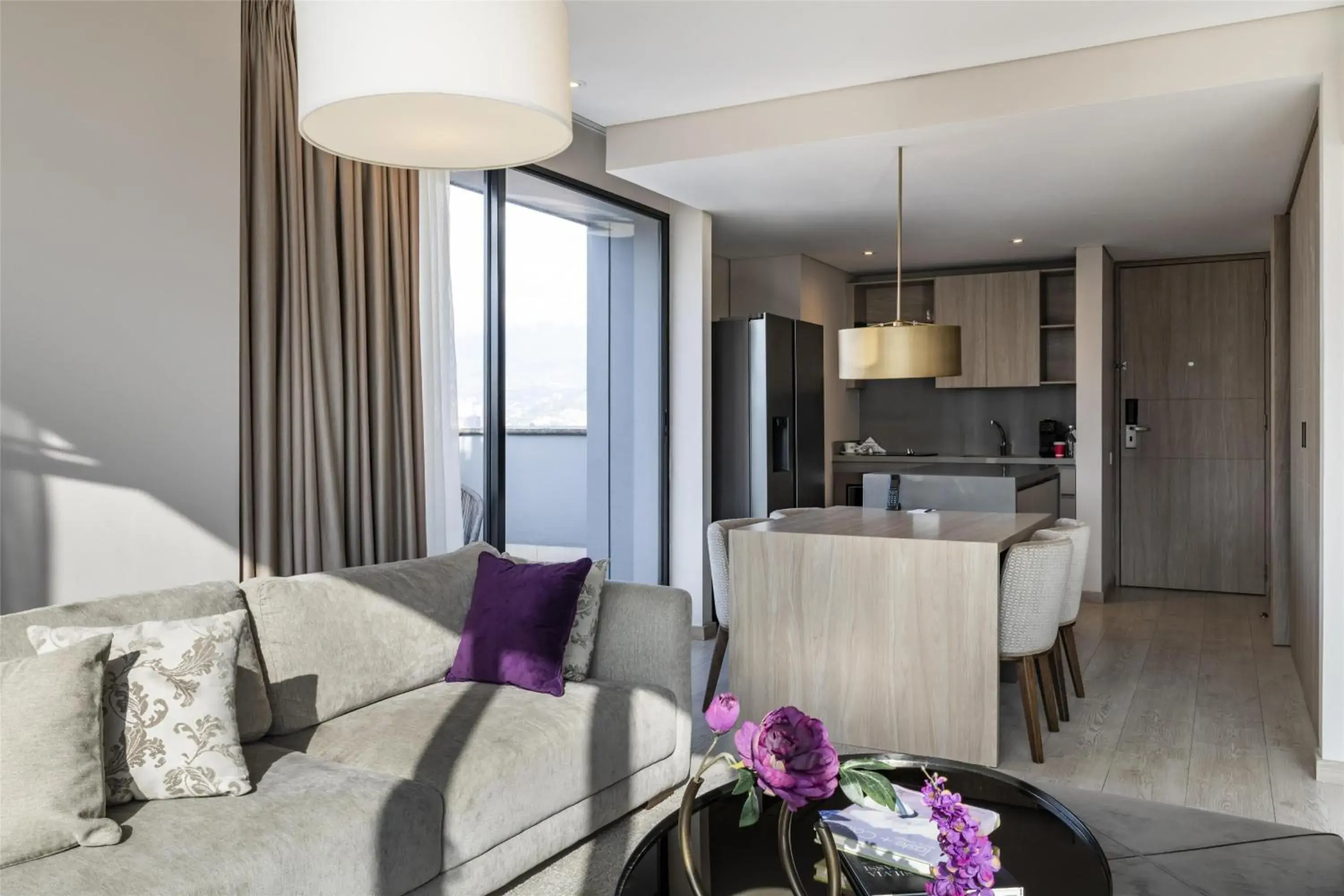 Living room in York Medellin, Curio Collection by Hilton Living room in York Medellin, Curio Collection by Hilton