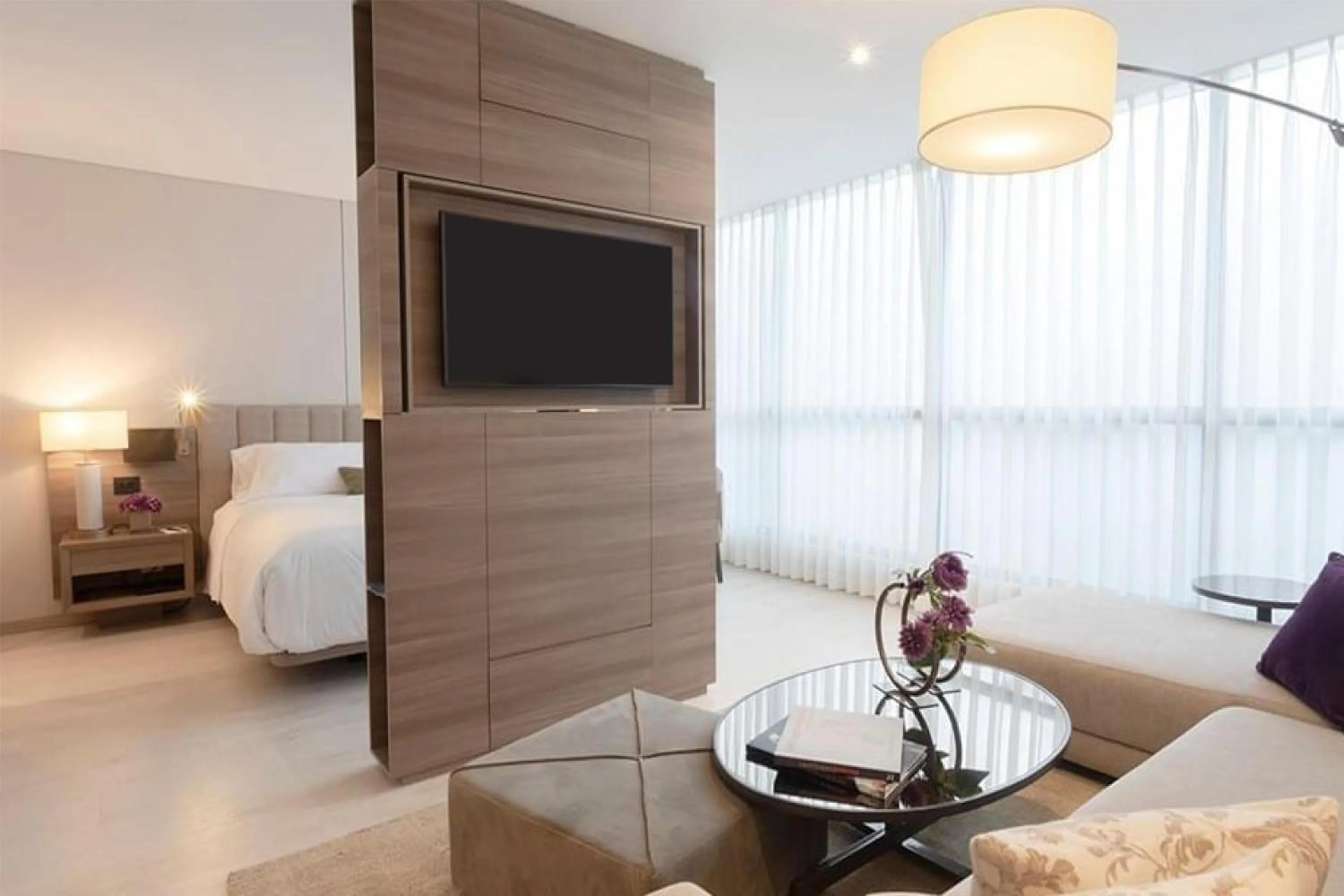 Living room, Bed in York Medellin, Curio Collection by Hilton