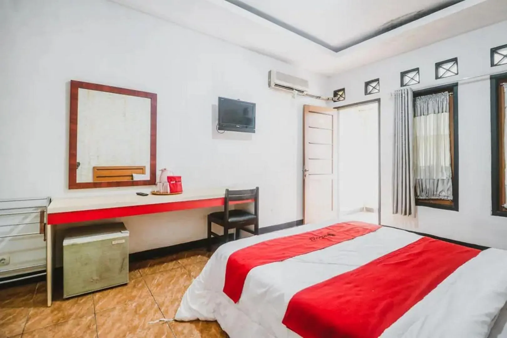 Bedroom, Bed in RedDoorz Plus at Neo Asri Hotel Megamendung Puncak Bogor
