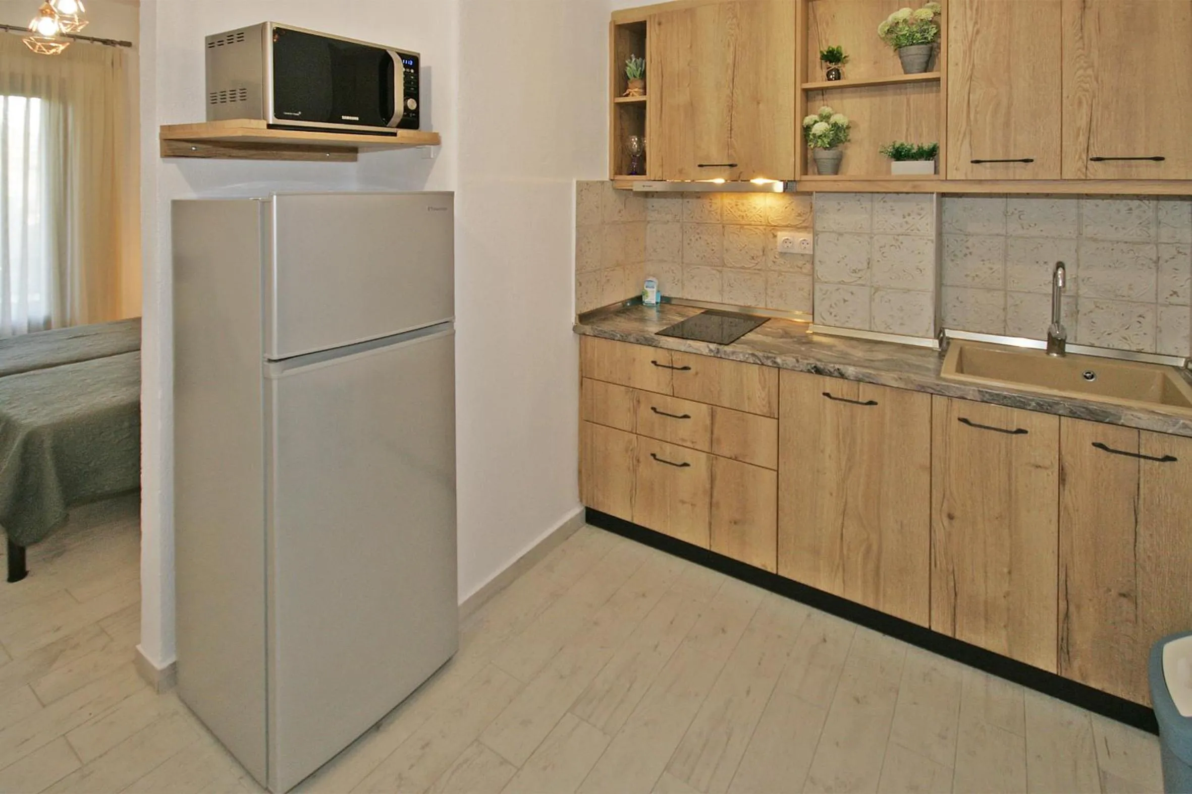 Kitchen or kitchenette in Villa Angela