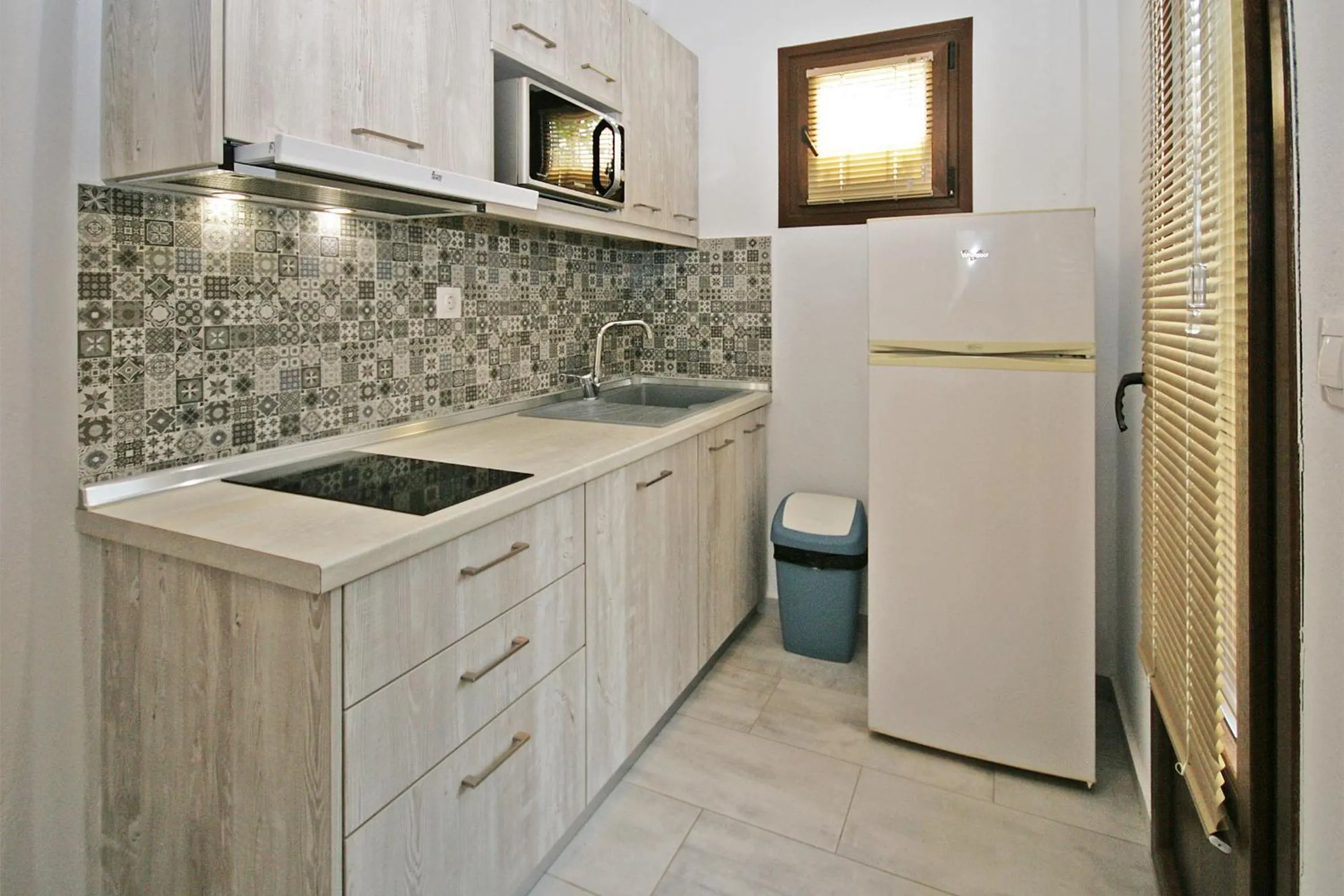 Kitchen or kitchenette in Villa Angela