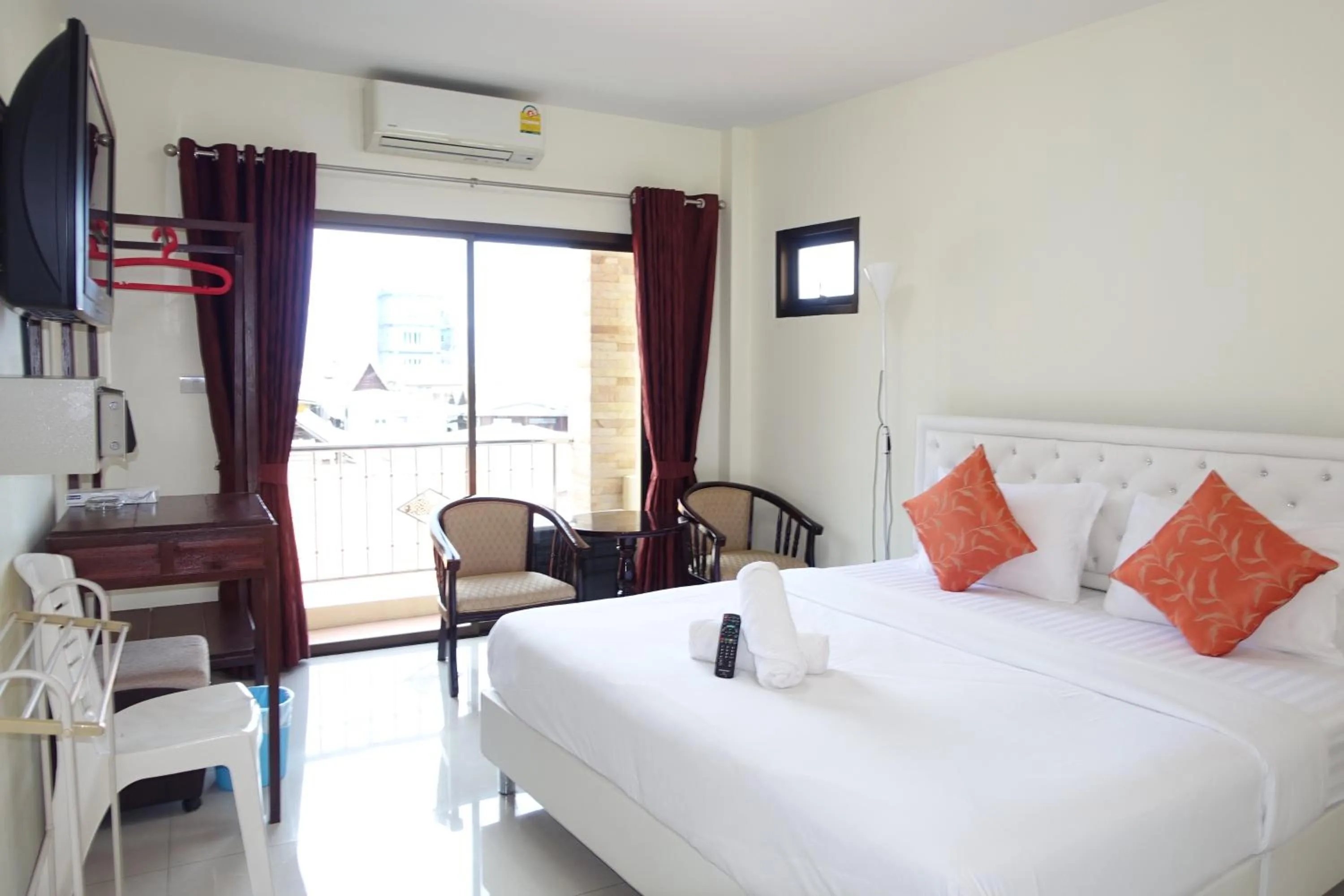 Bed in Baan Taweesuk Guest House