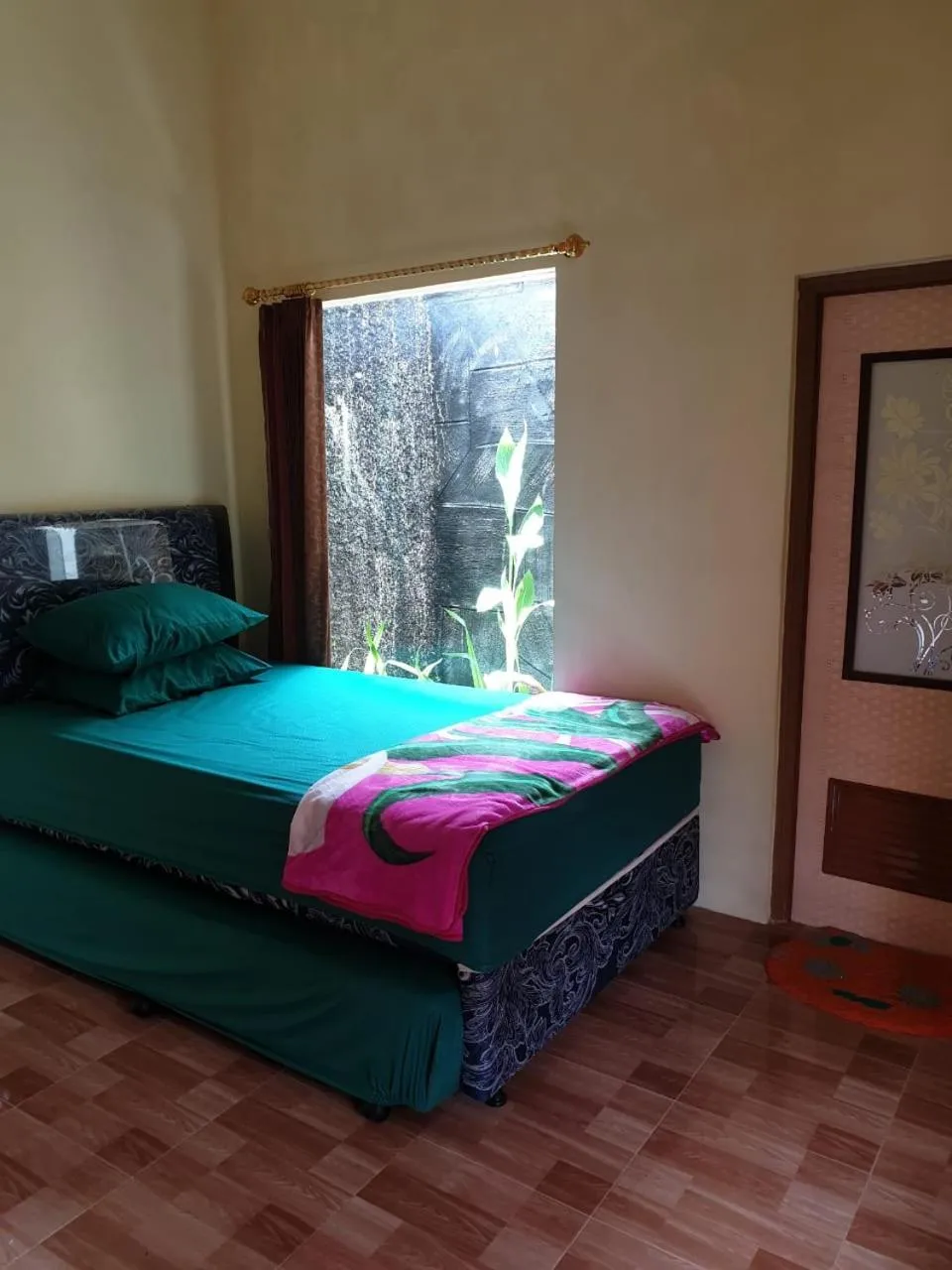 Bedroom, Bed in Nita's Homestay Banyuwangi