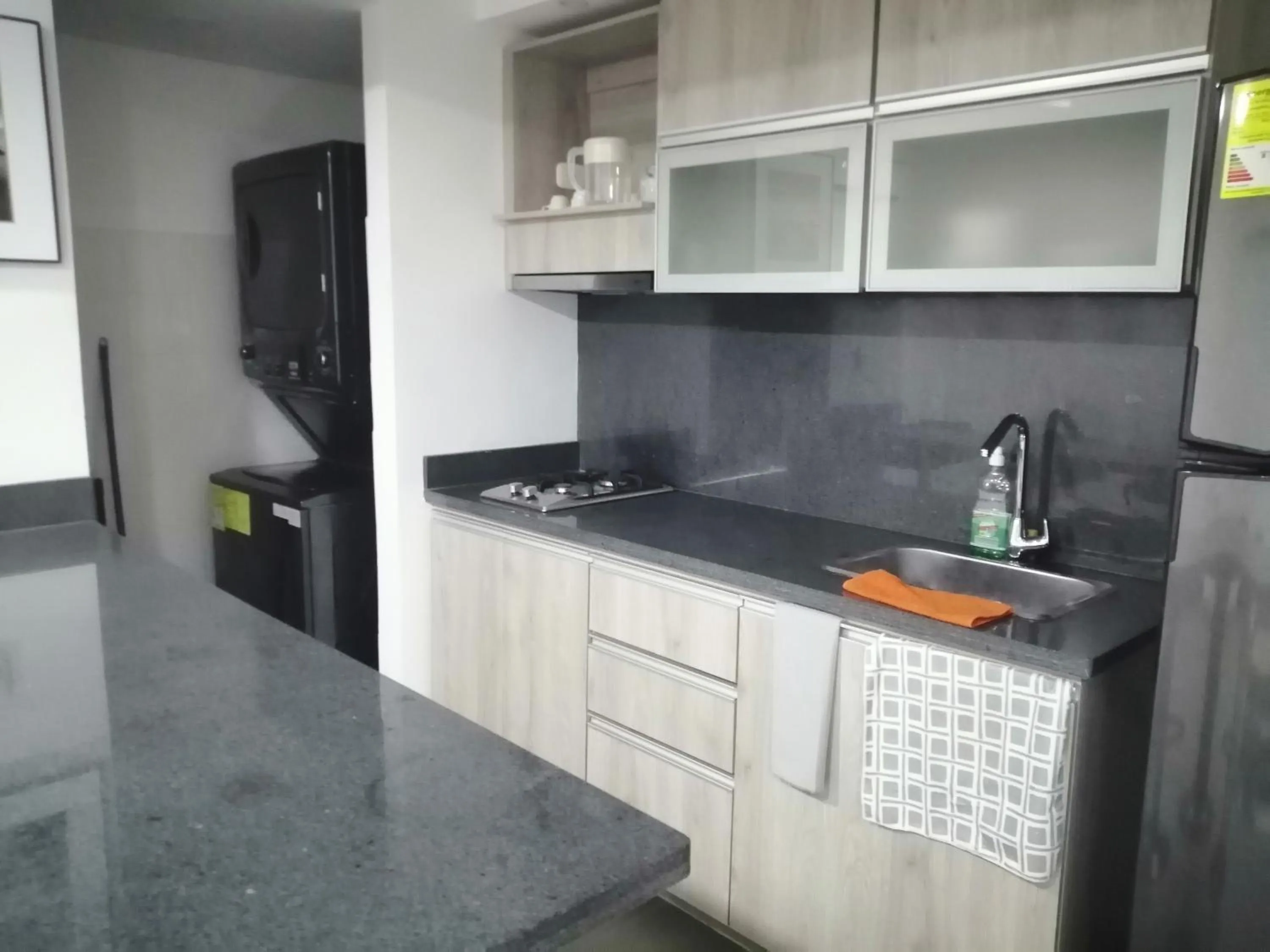 Kitchen or kitchenette in Berilo Deluxe Apartahotel