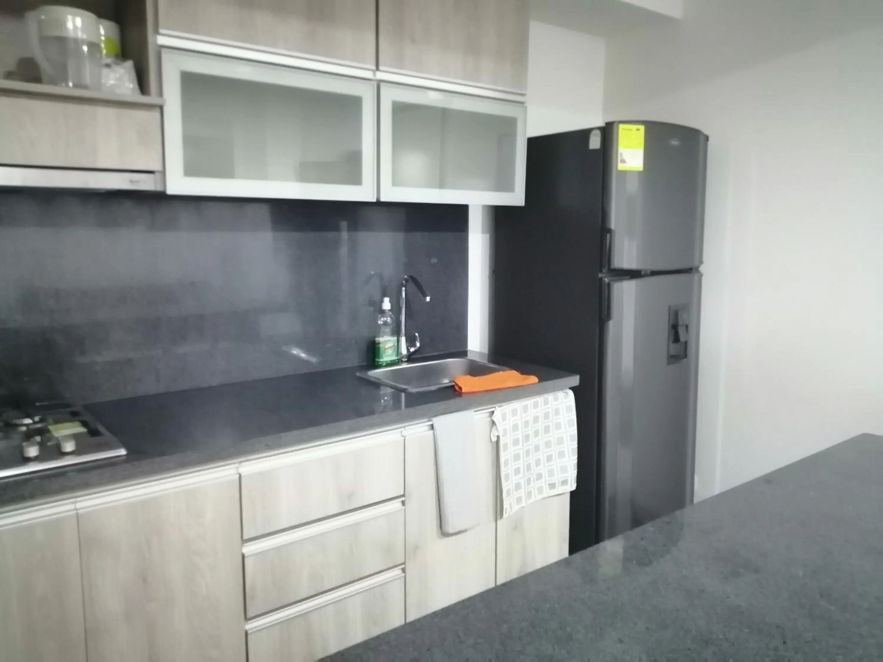 Kitchen or kitchenette in Berilo Deluxe Apartahotel