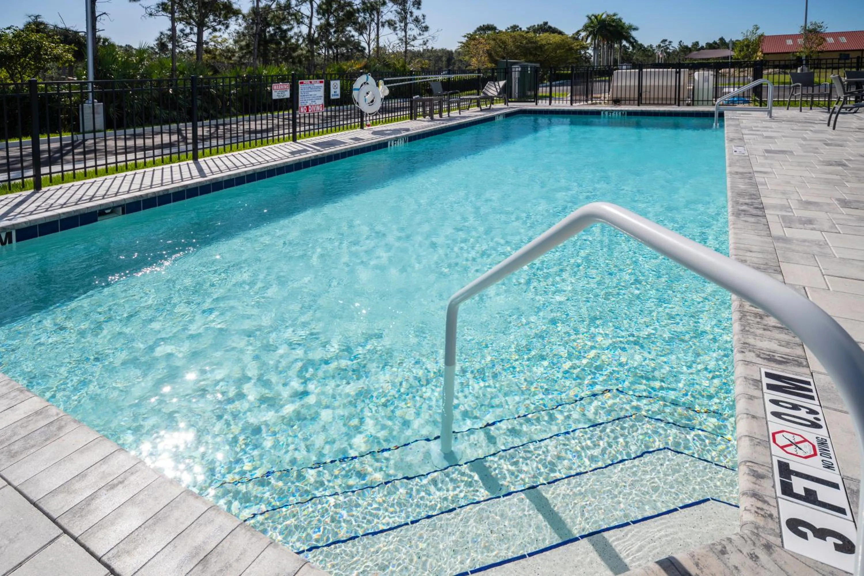 Swimming pool in Holiday Inn Express & Suites - Fort Myers Airport by IHG