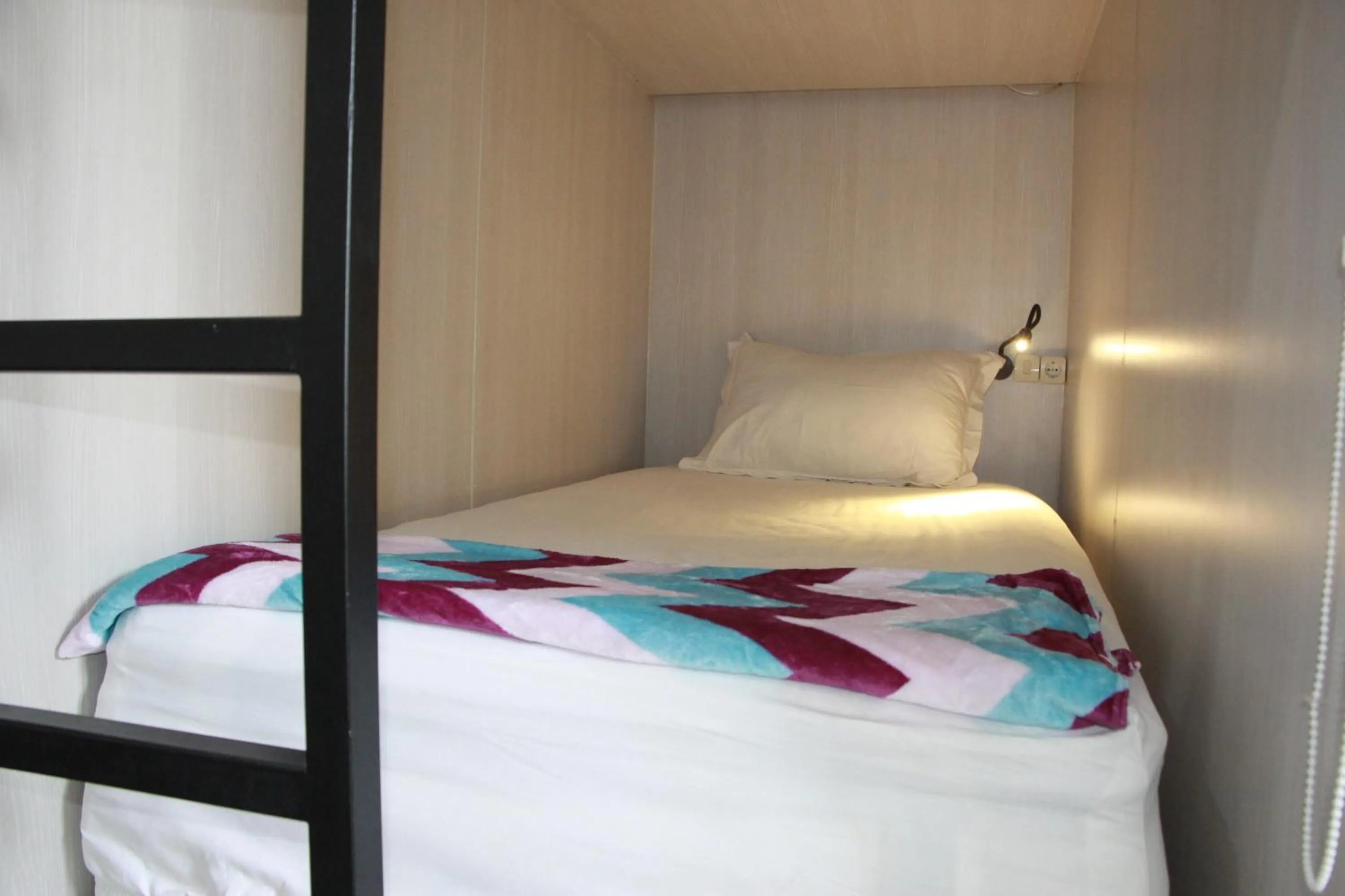 Bed in The Peak Guest House