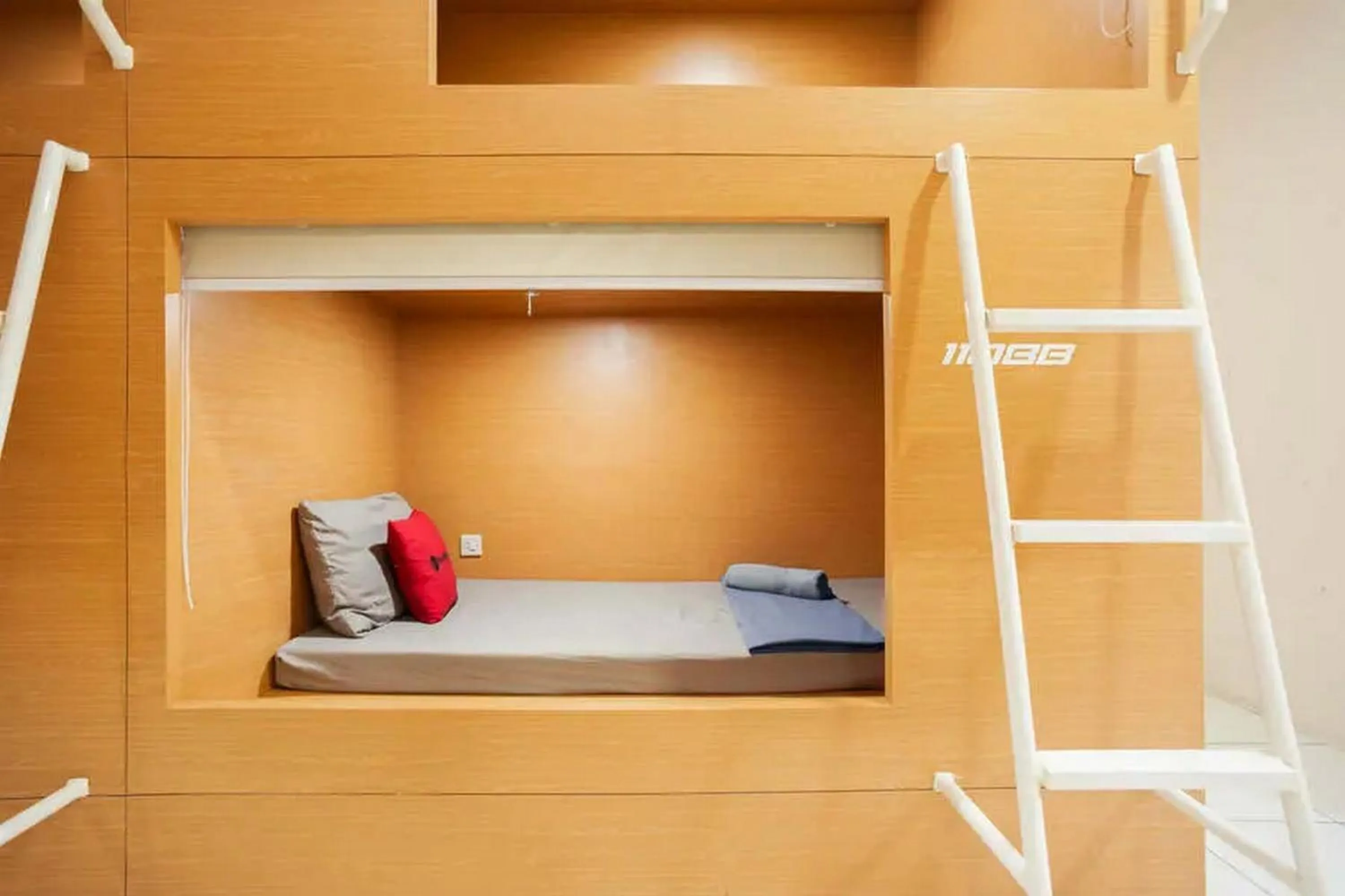 Bedroom, Bed in RedDoorz Hostel near Taman Puring