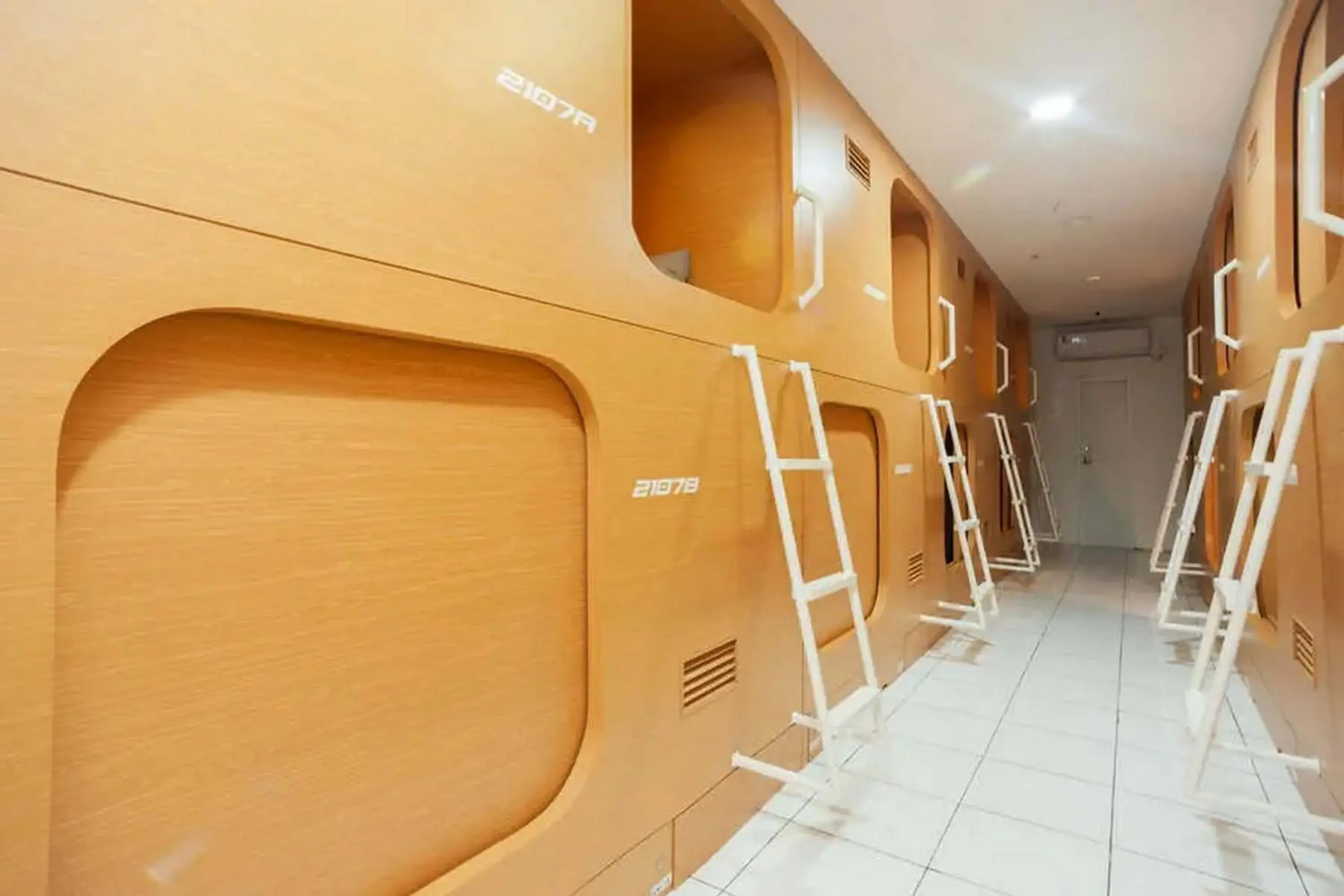 Bunk Bed in Mixed Dormitory Room in RedDoorz Hostel near Taman Puring Bunk Bed in Mixed Dormitory Room in RedDoorz Hostel near Taman Puring