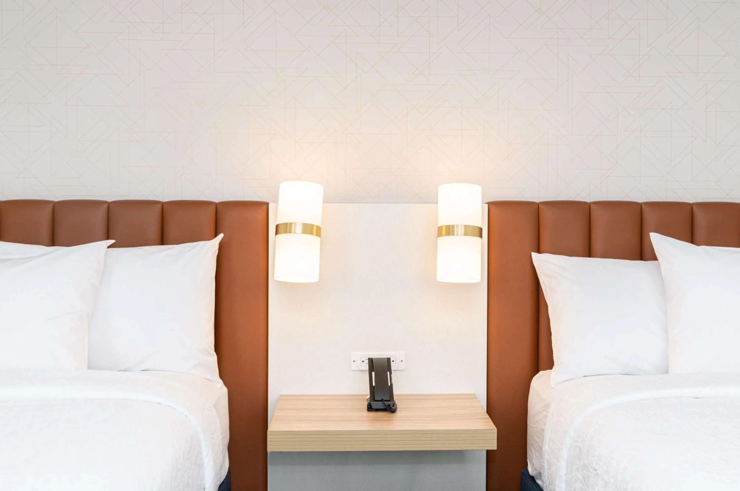 Bed in Hilton Garden Inn Flint Downtown