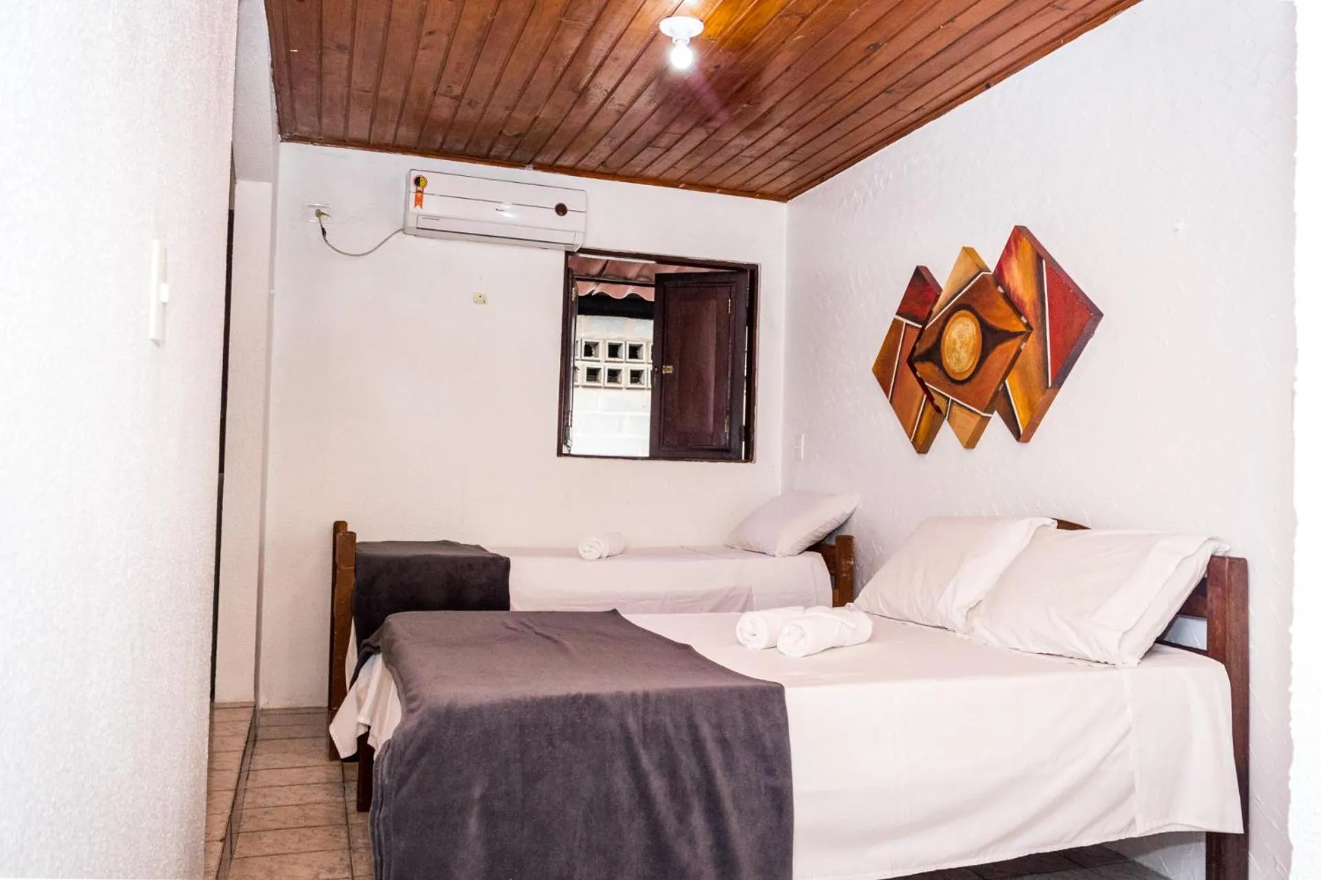Bed in Pousada Bon Vivant
