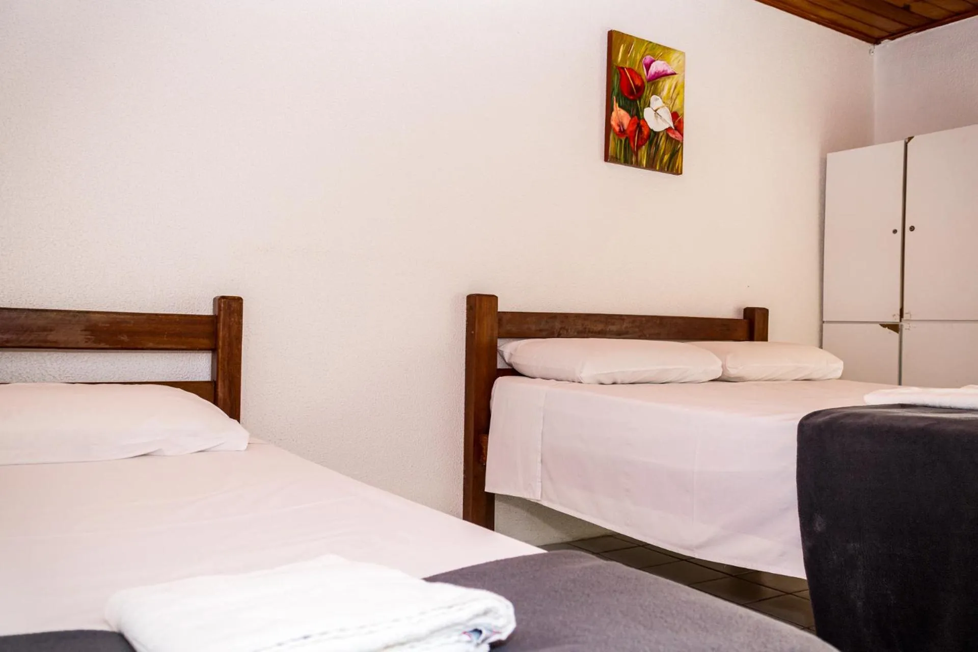 Bed in Pousada Bon Vivant
