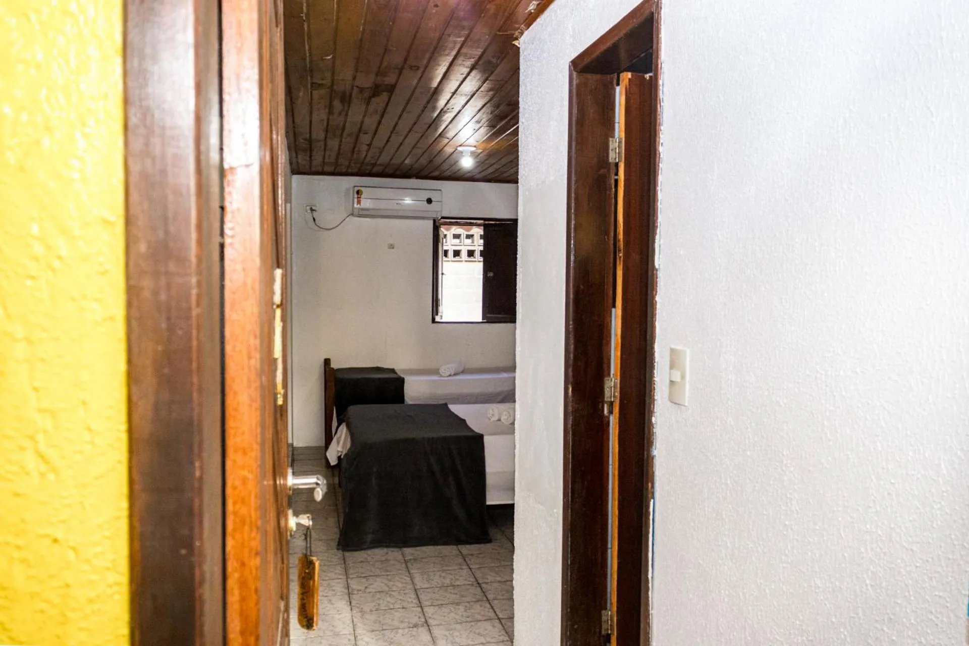 Bed in Pousada Bon Vivant