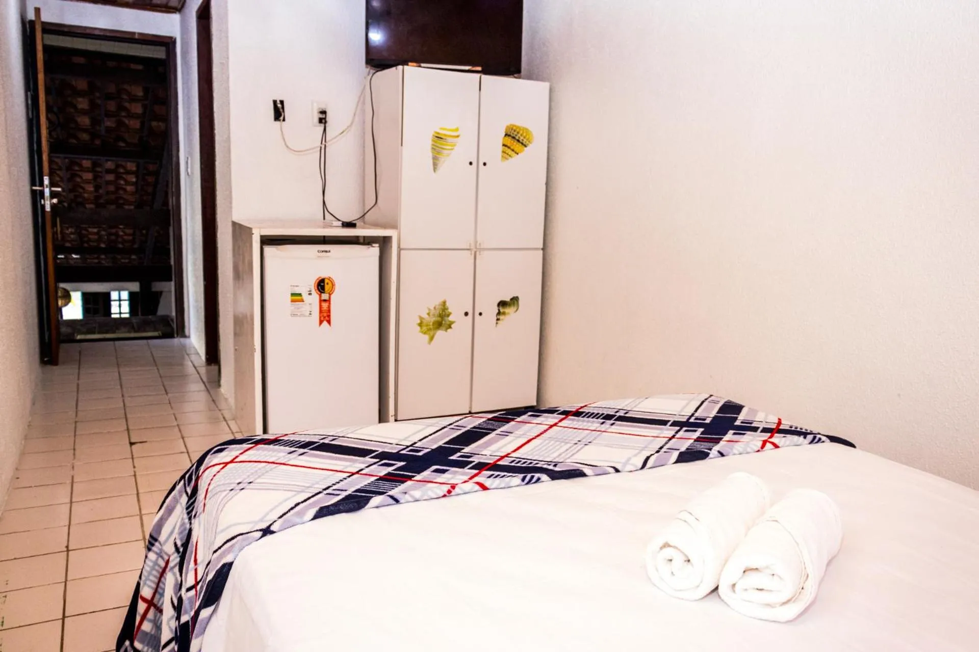 Bed in Pousada Bon Vivant