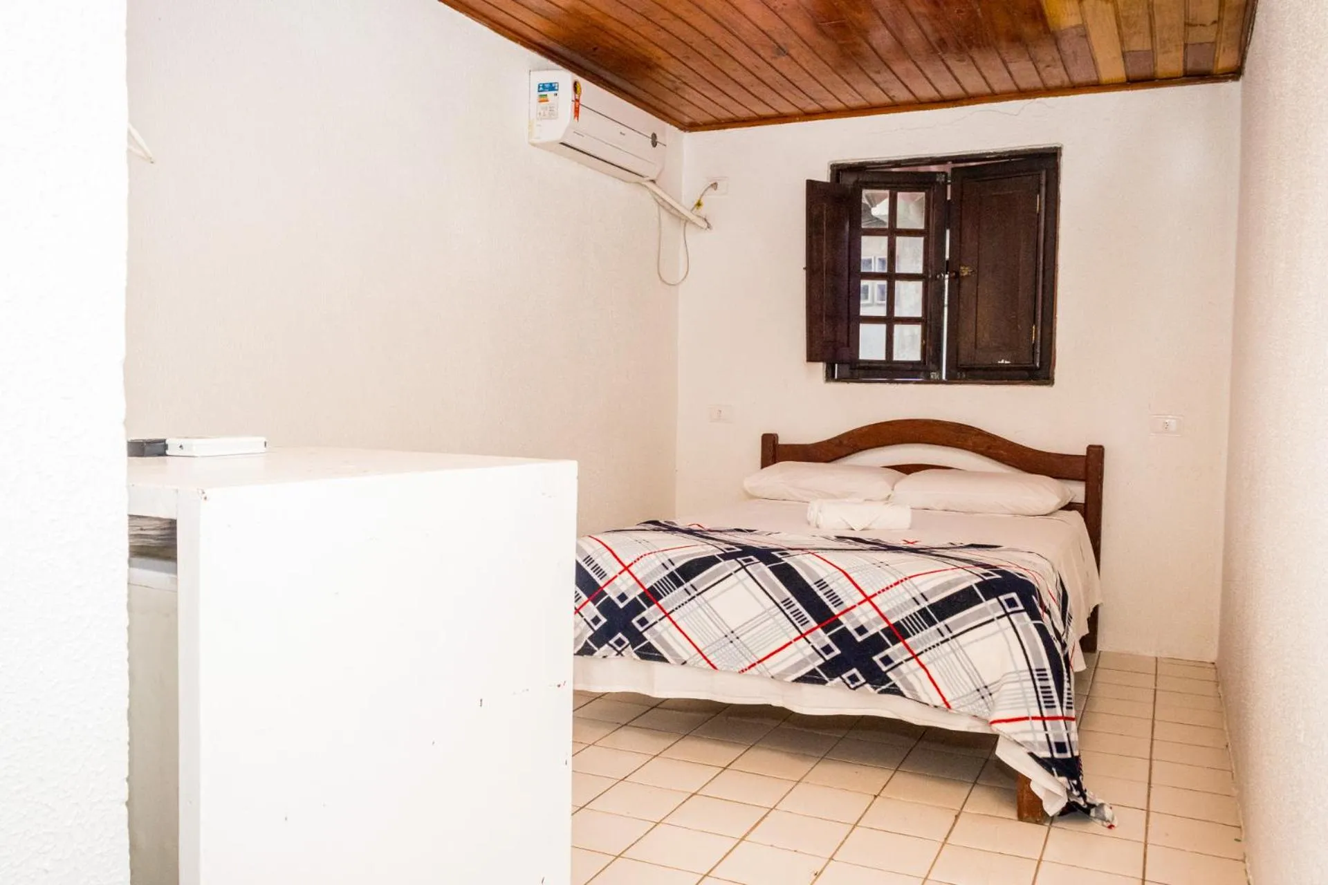 Bed in Pousada Bon Vivant