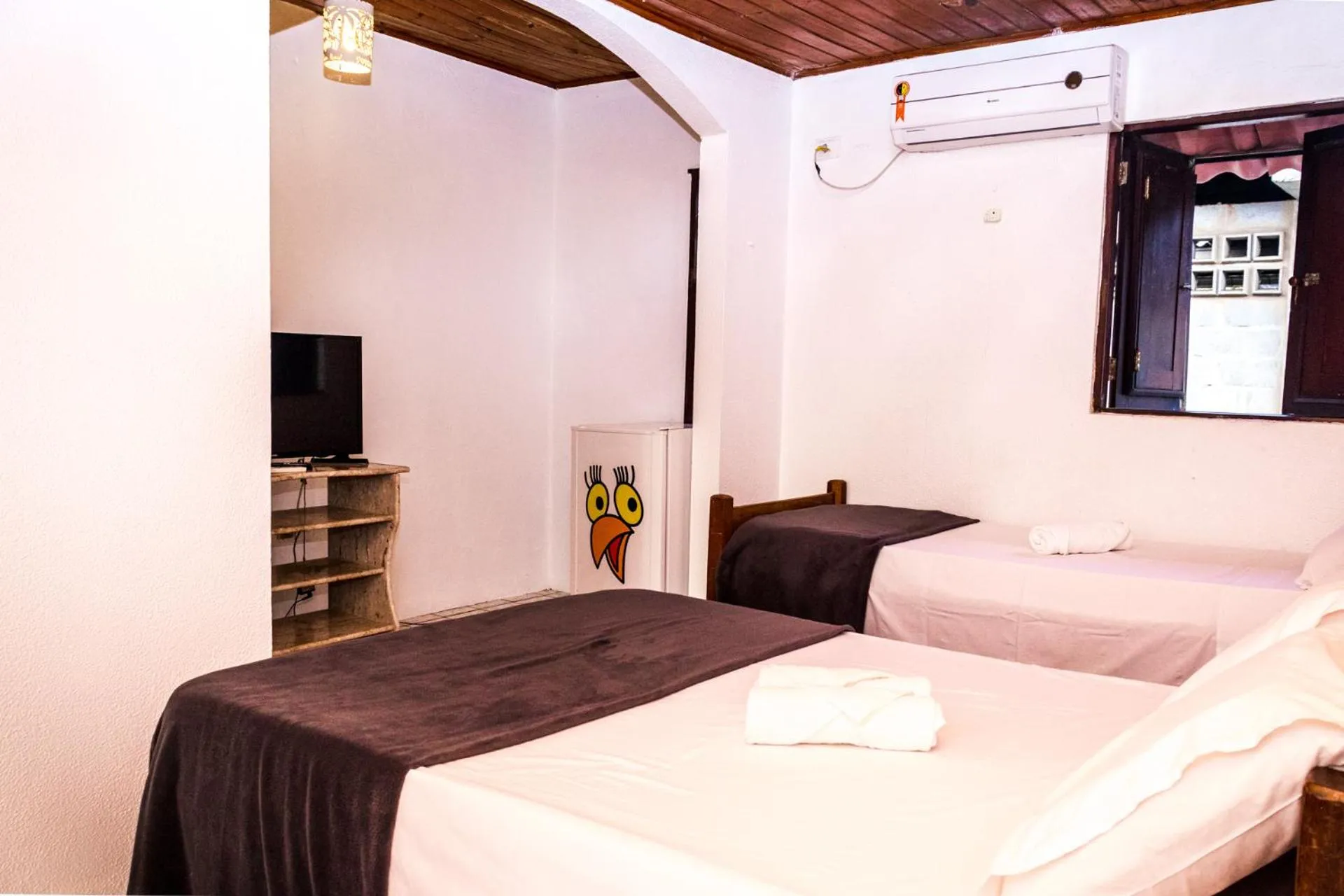Bed in Pousada Bon Vivant
