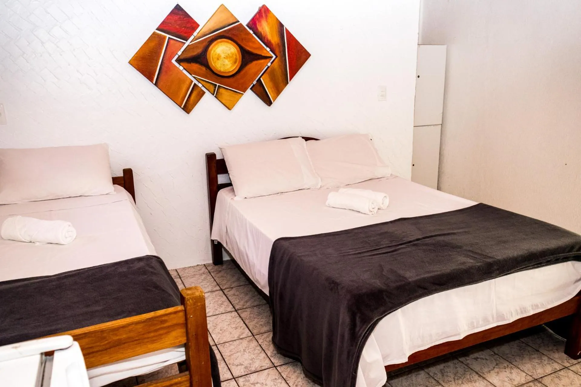 Bed in Pousada Bon Vivant